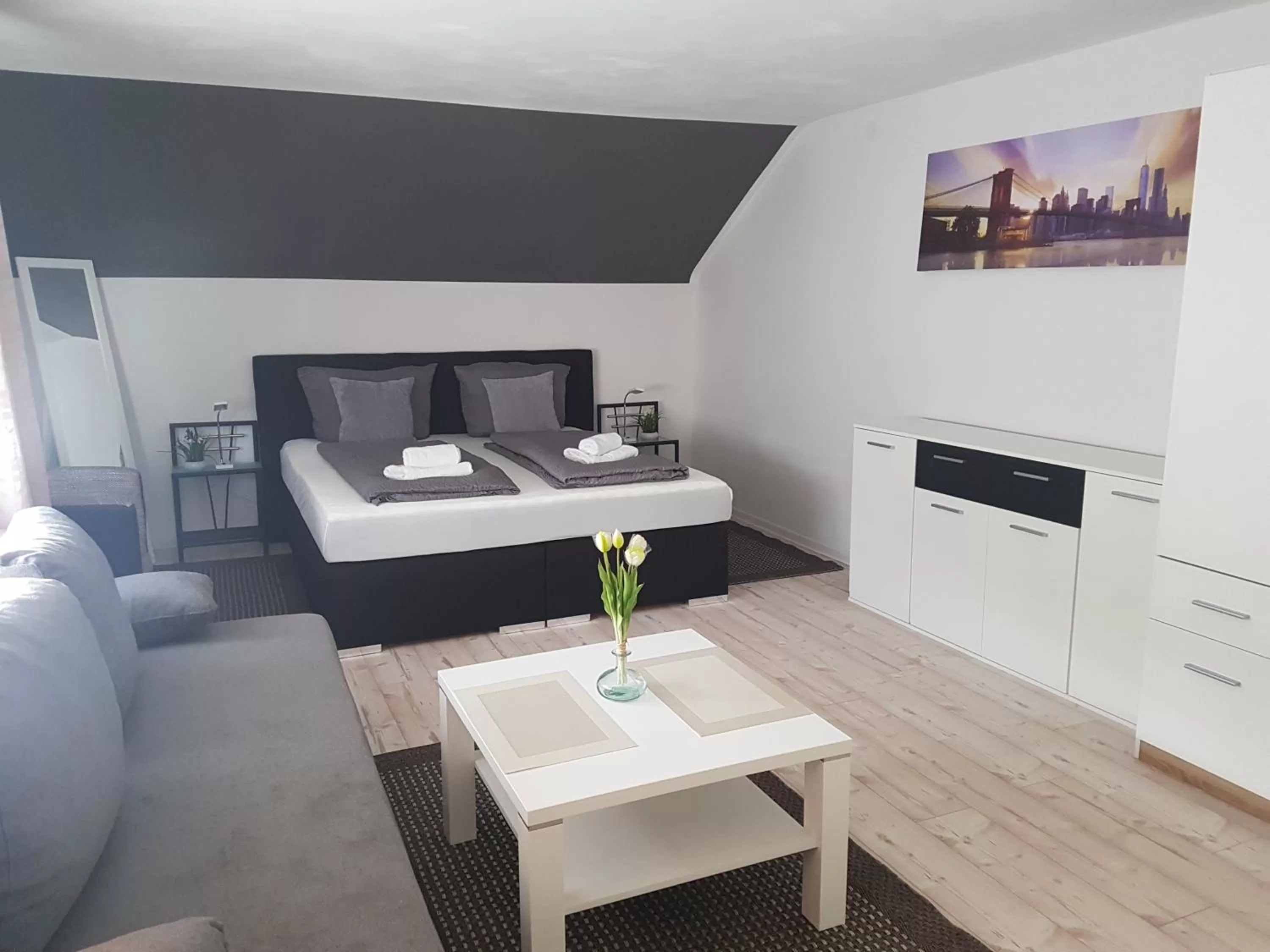 Living room, Bed in Hotel Ari