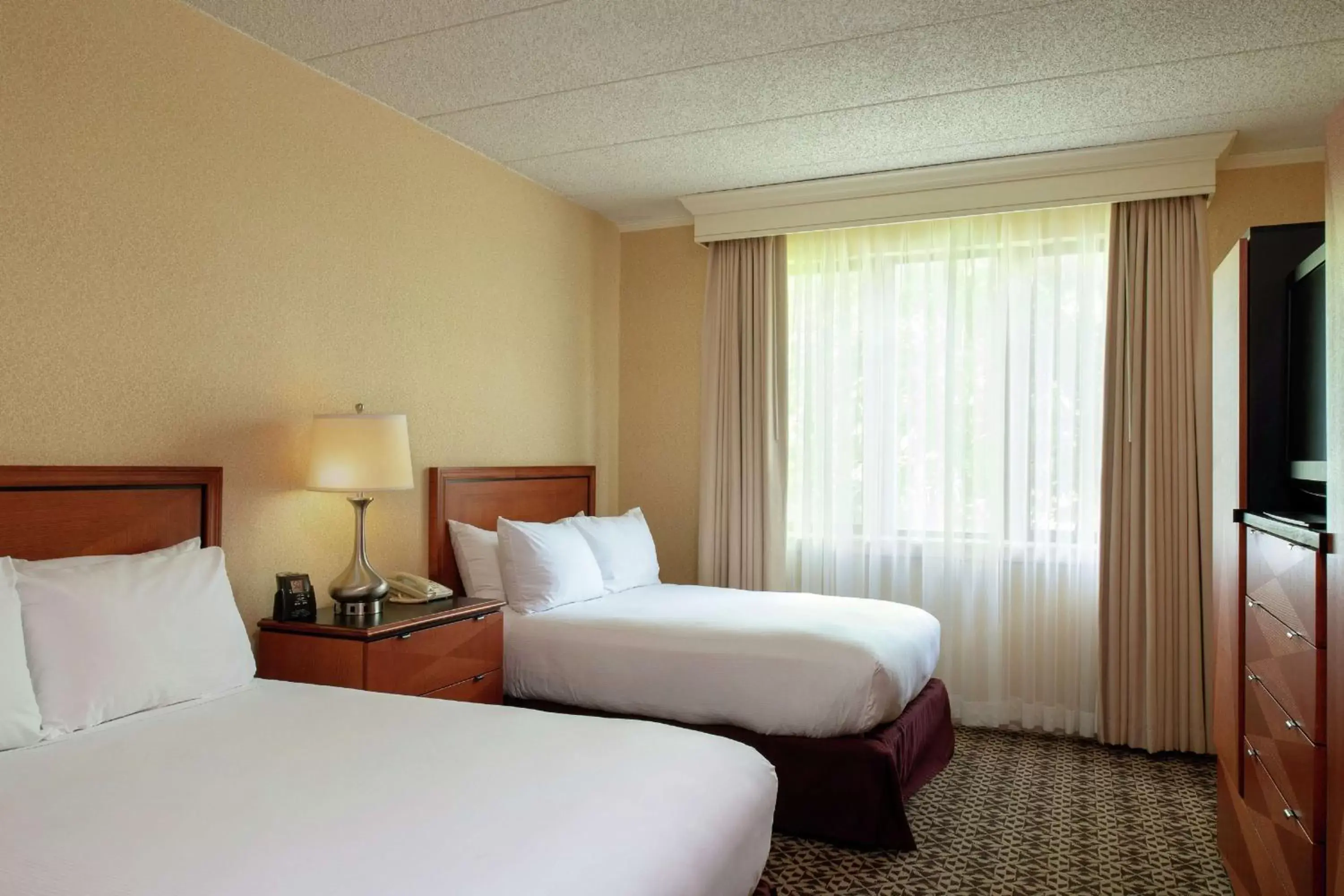 Bed in DoubleTree Suites by Hilton Mount Laurel