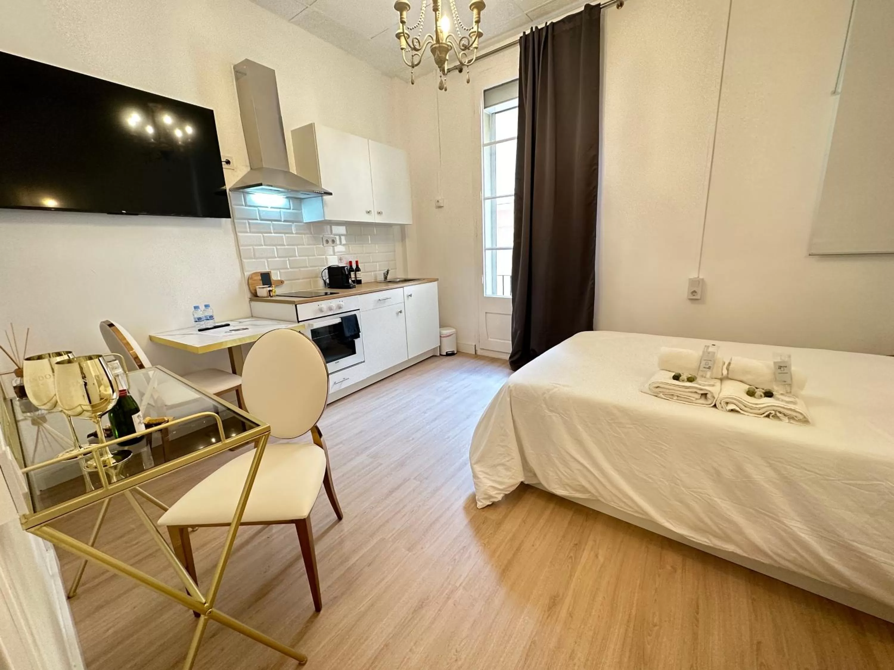 Bed, TV/Entertainment Center in Siboni Luxury Rooms - Adults Only