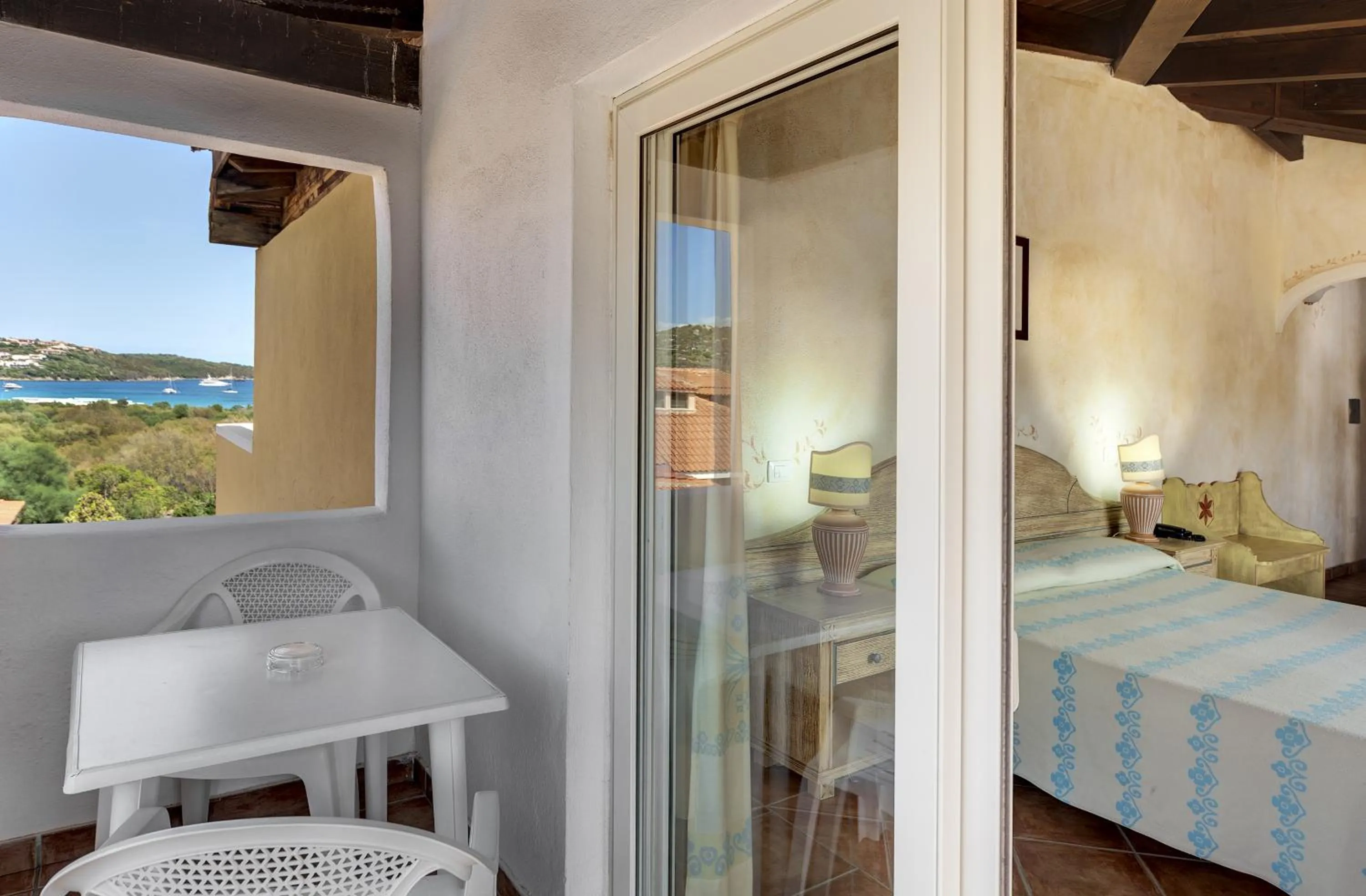 Balcony/Terrace, Bed in Colonna Beach Hotel Marinella