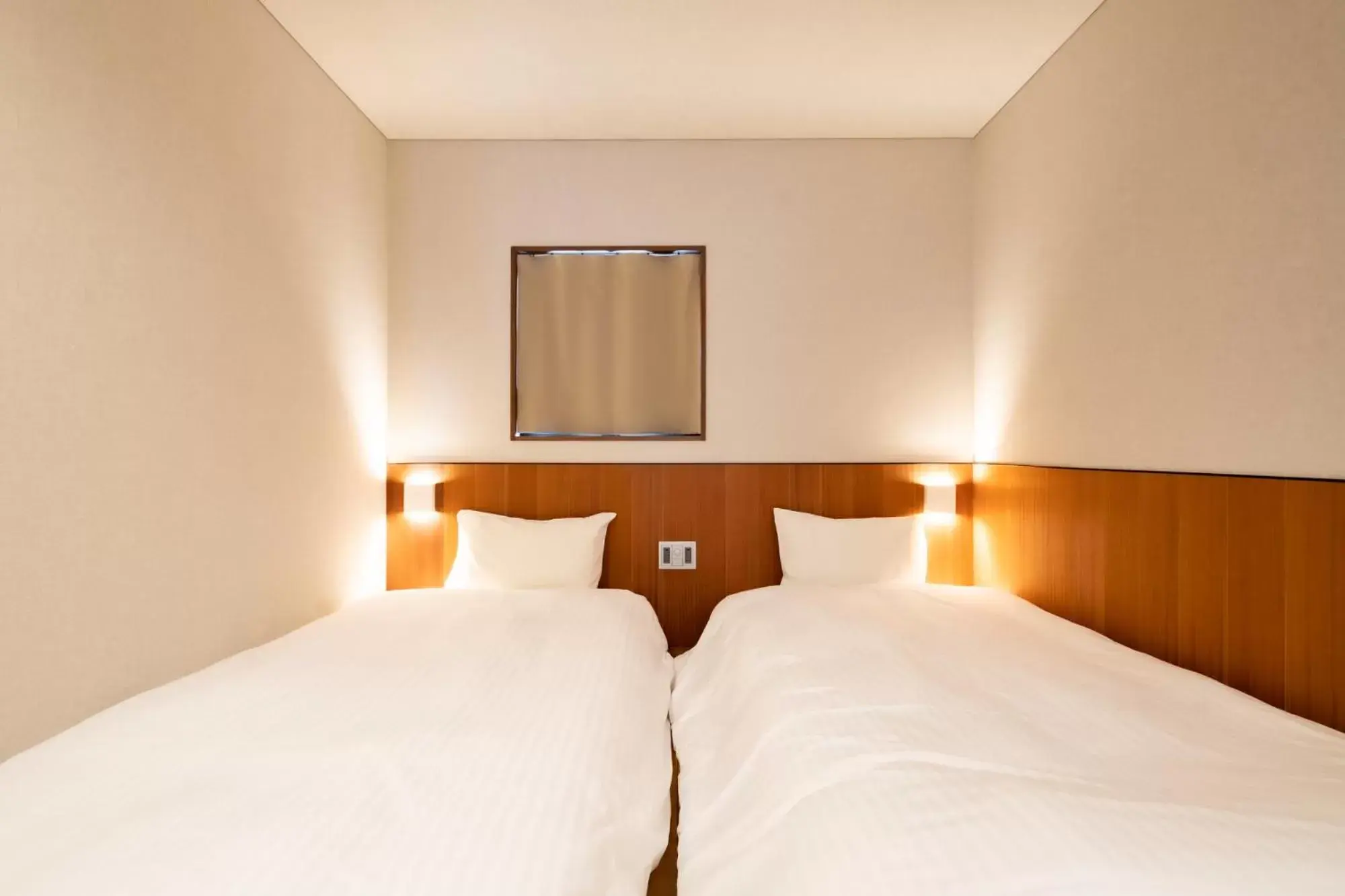 Bed in &HOTEL HAKATA