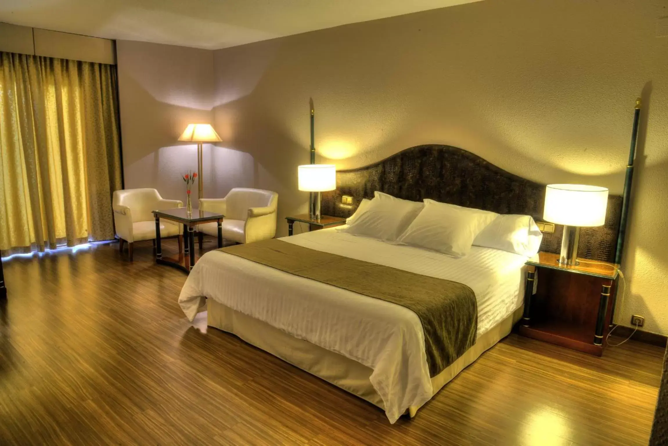 Bed in Beatriz Toledo Auditorium & Spa