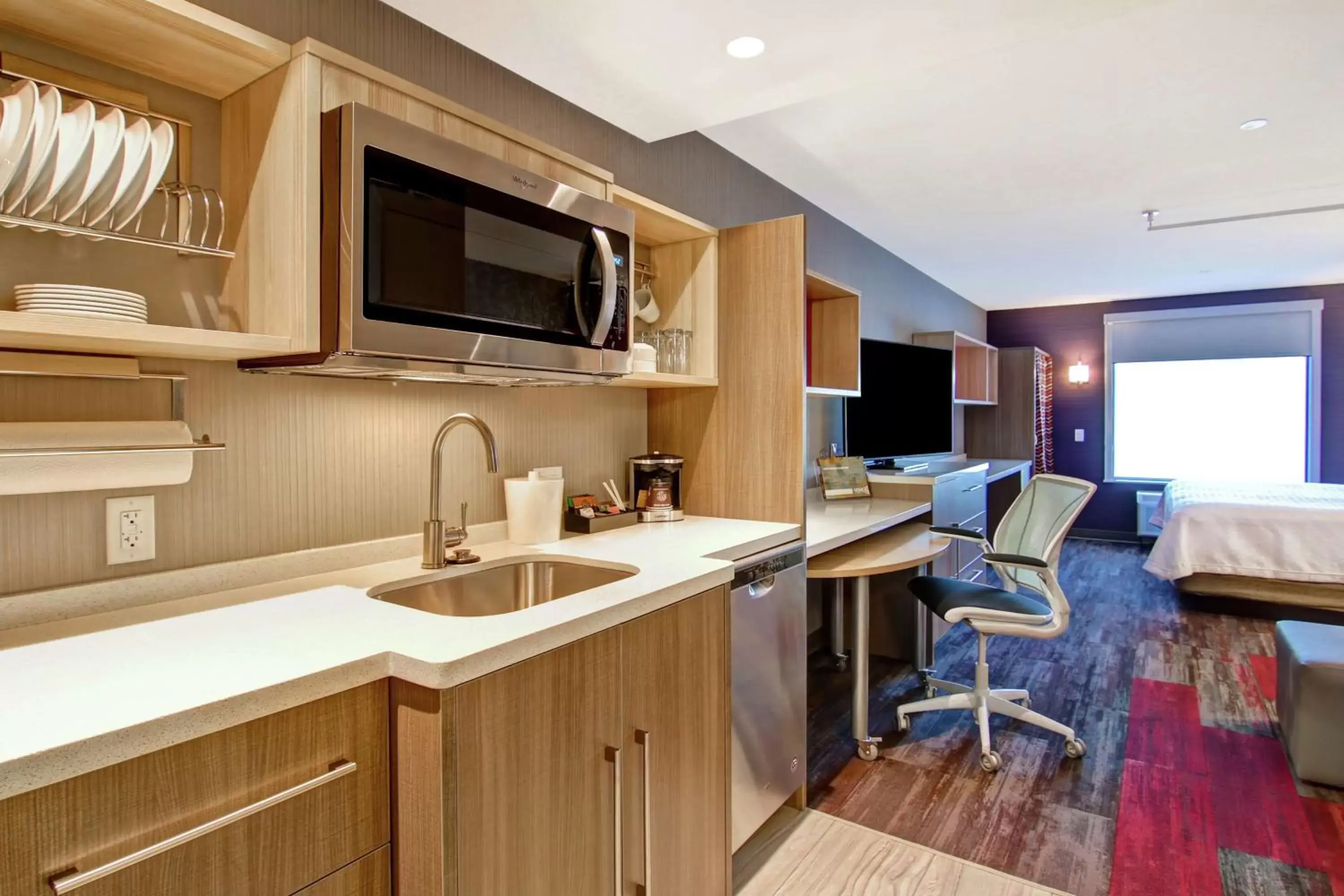 Bedroom, Kitchen/Kitchenette in Home2 Suites By Hilton Edmonton South