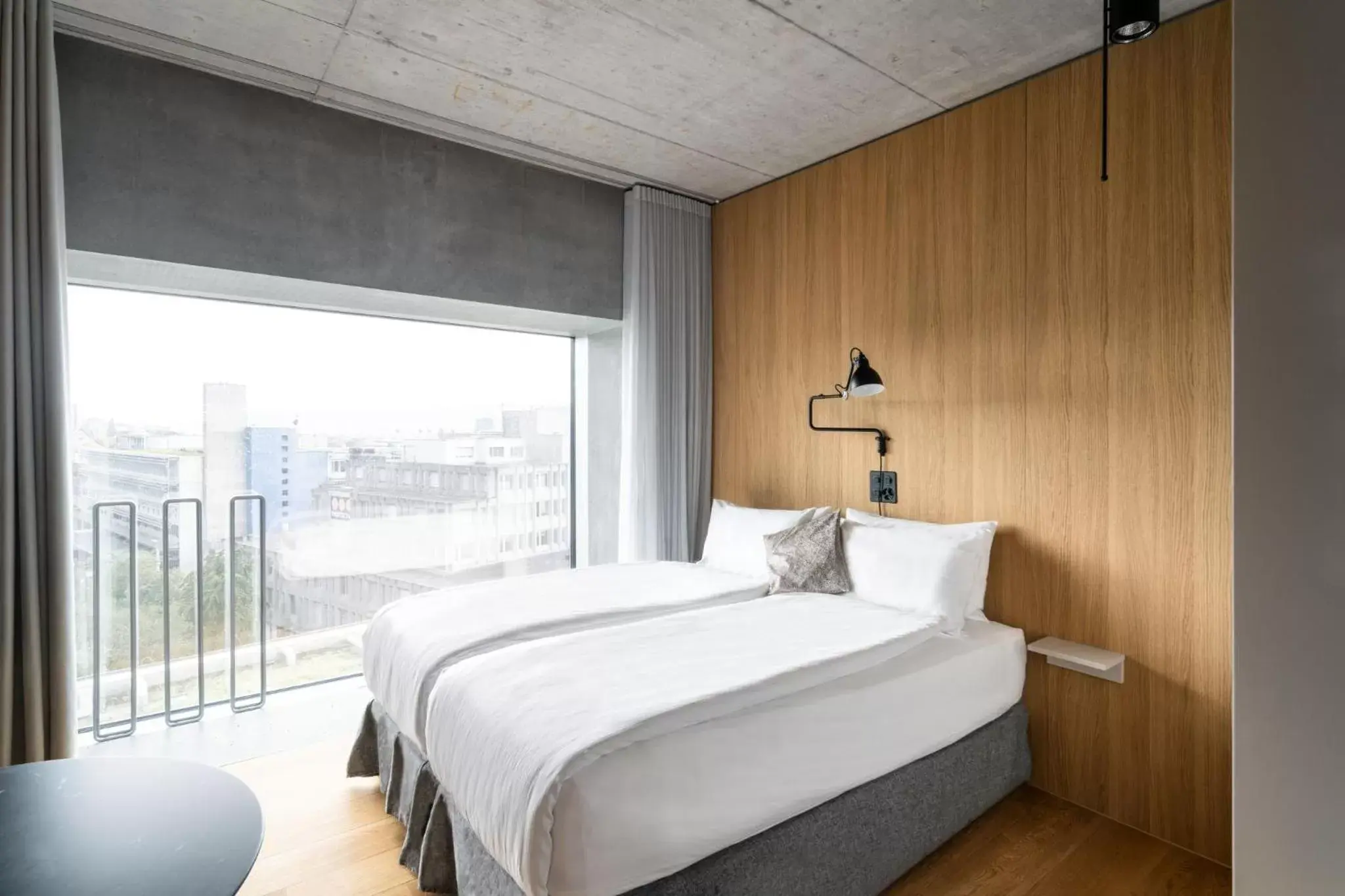 City view, Bed in Placid Hotel Design & Lifestyle Zurich