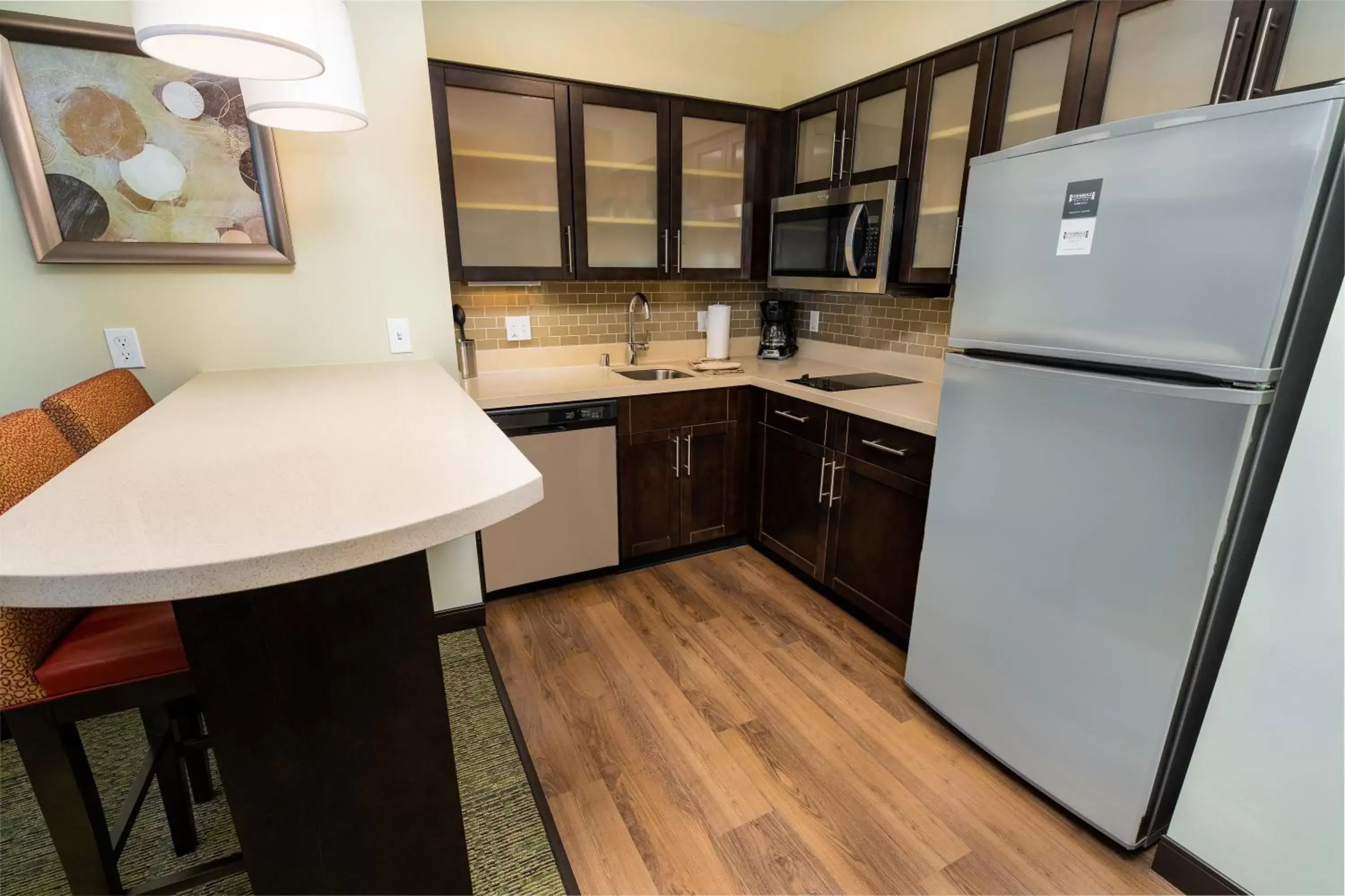 Photo of the whole room, Kitchen/Kitchenette in Staybridge Suites - Newark - Fremont, an IHG Hotel