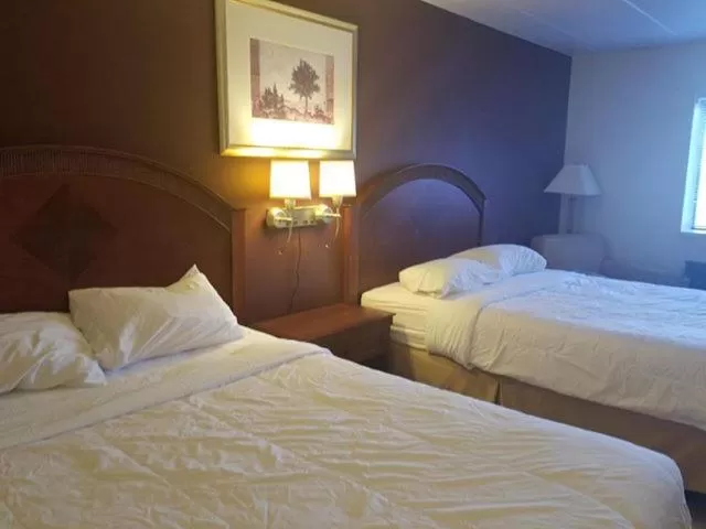 Bed in Red Apple Inn