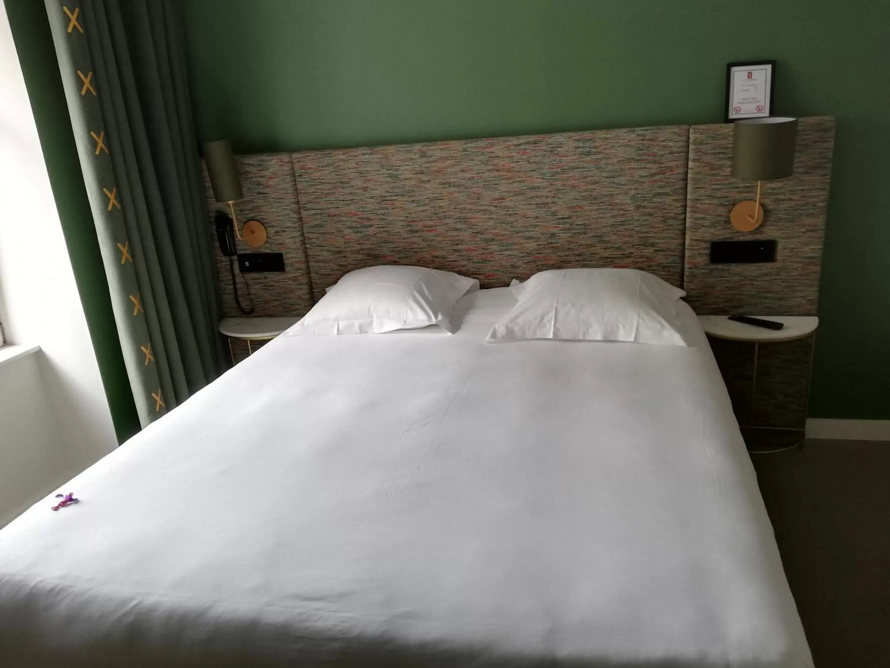 Bed in Le Kléber Hôtel