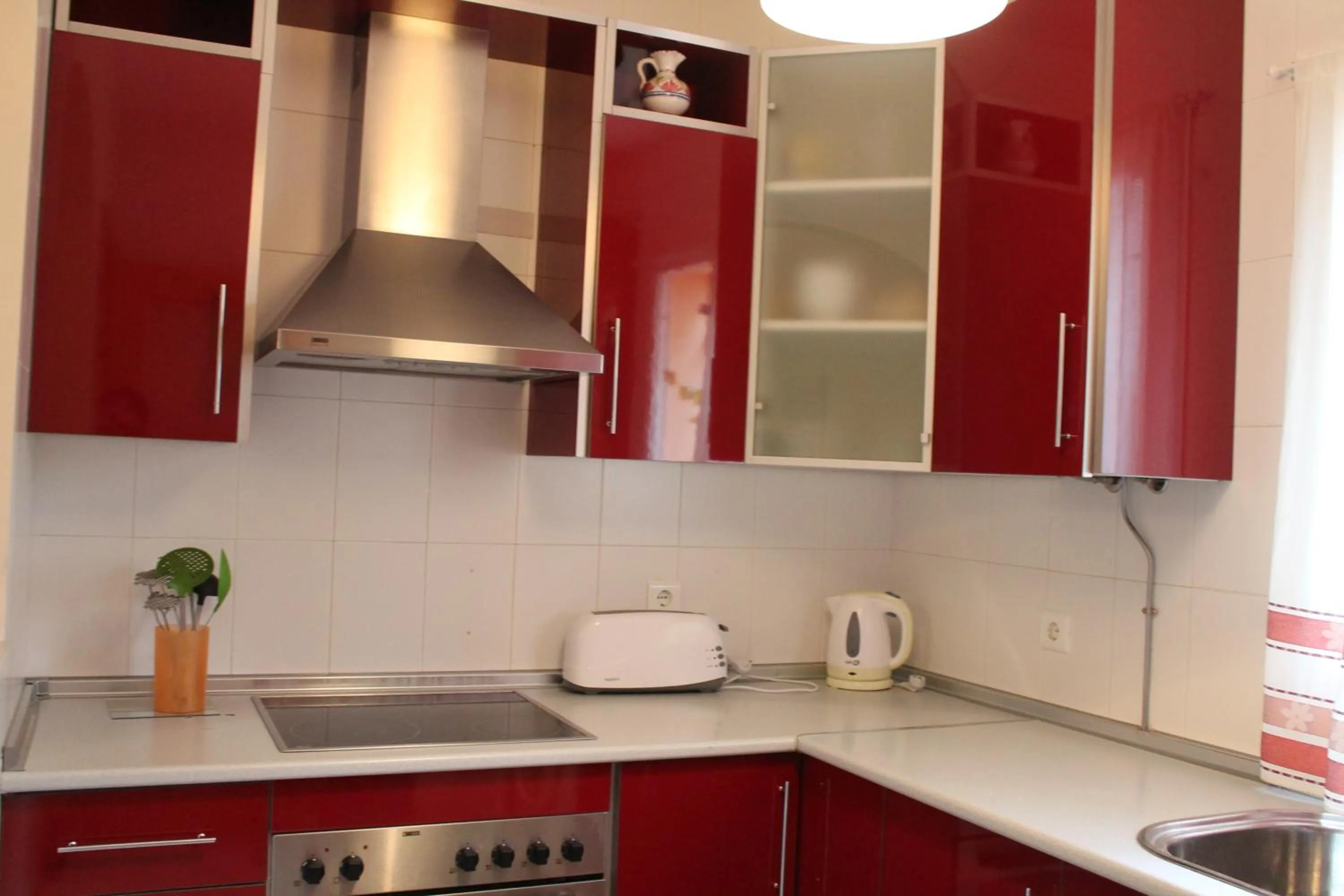 Kitchen or kitchenette in Apartamentos Turísticos Plaza del Olvido