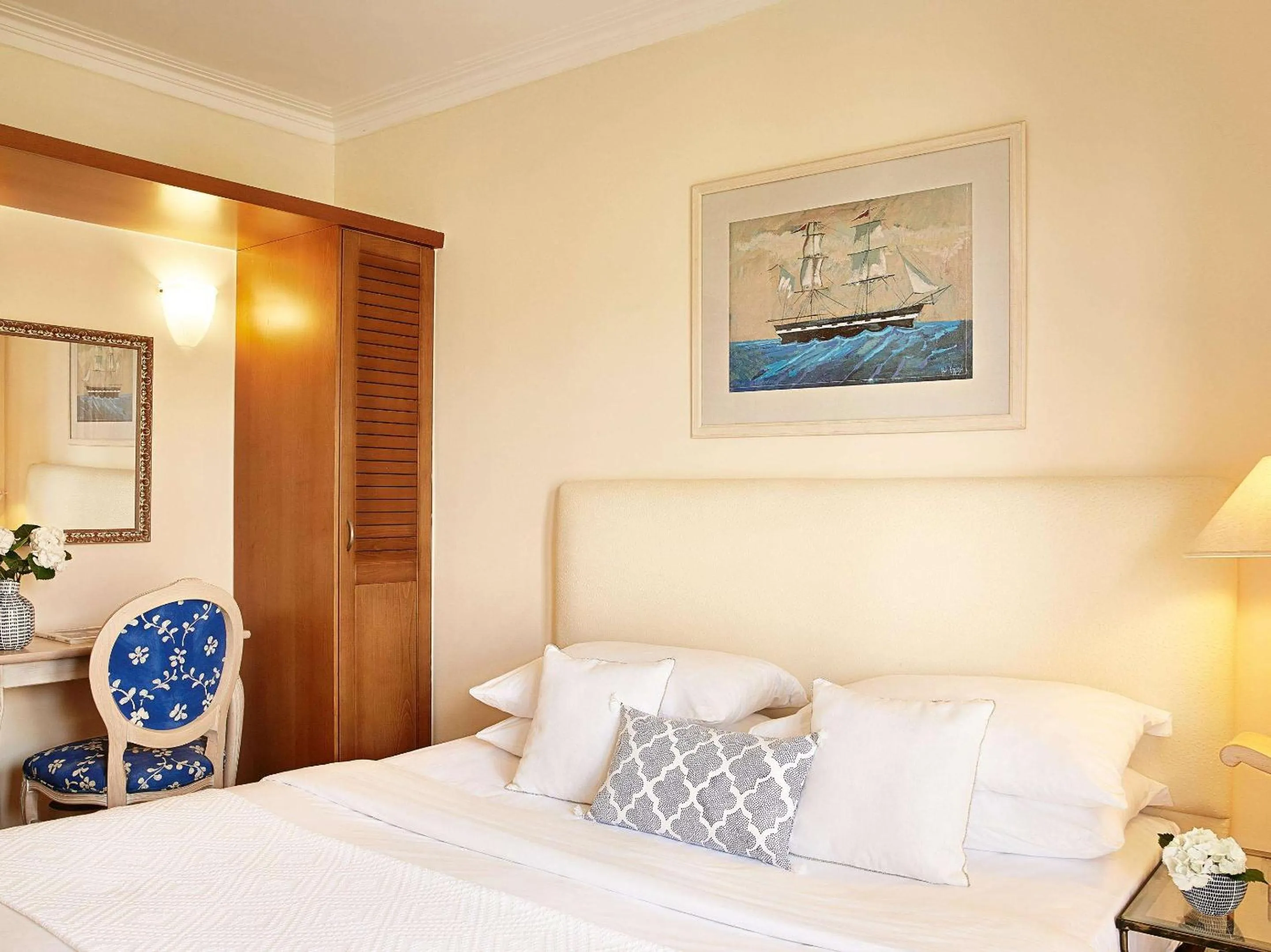 Bed in Grecotel Marine Palace & Aqua Park