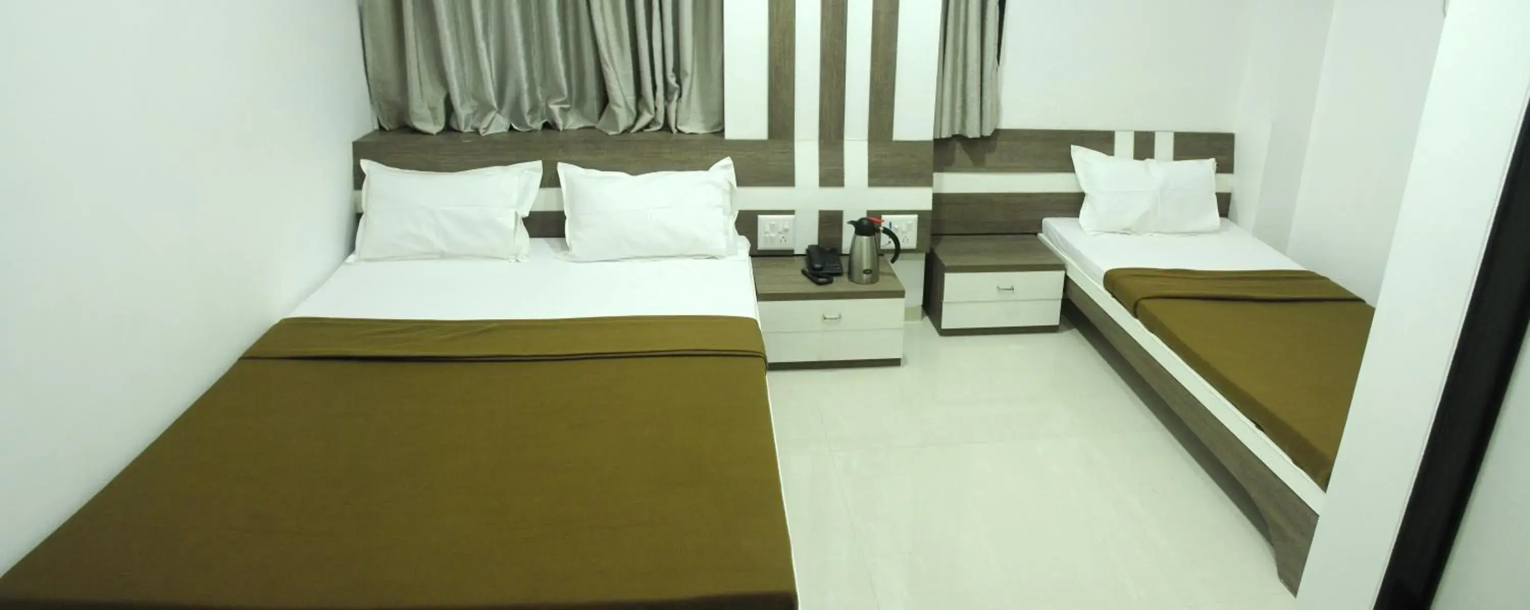 Bed in Hotel City View