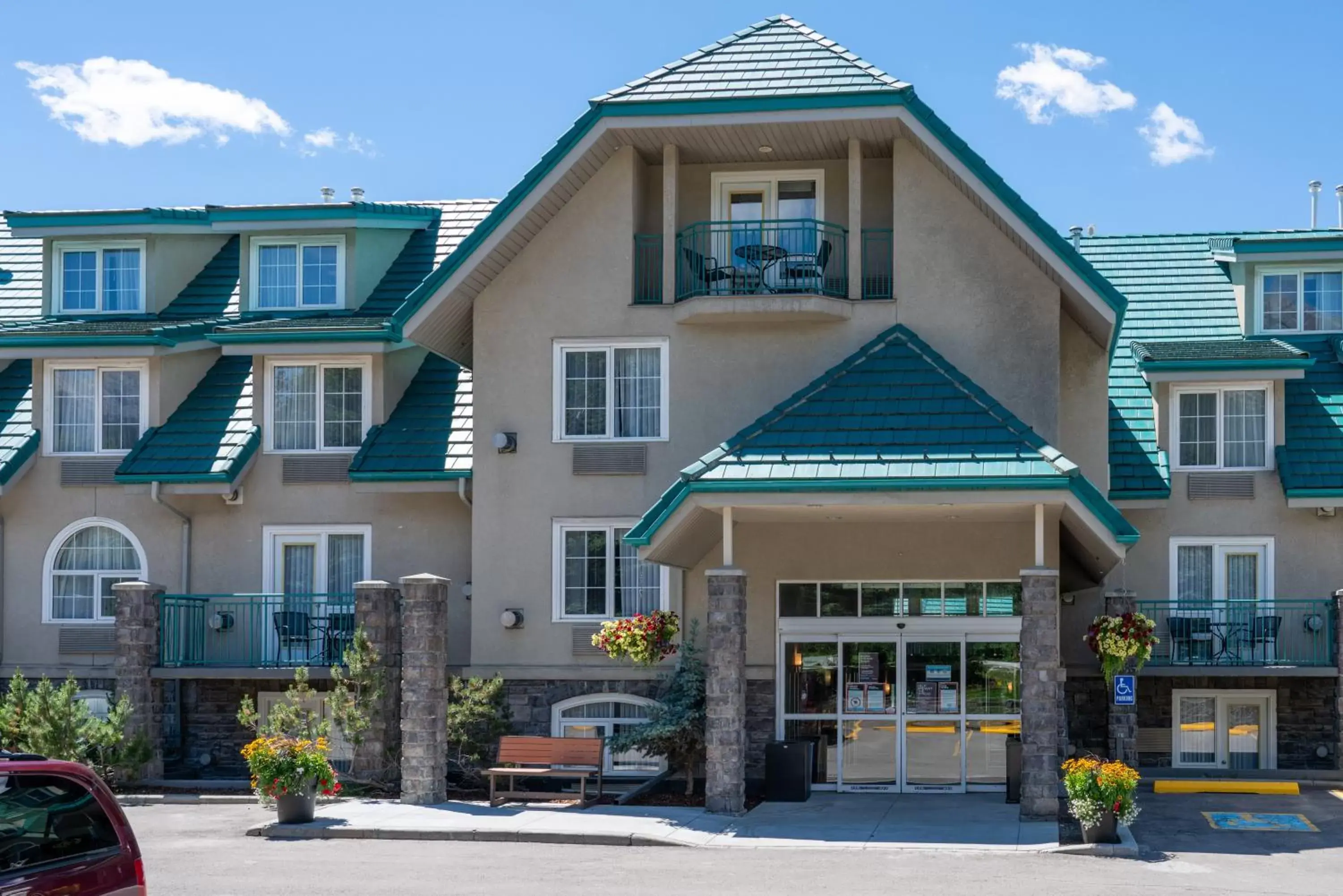 Property building in Pocaterra Inn & Waterslide Property building in Pocaterra Inn & Waterslide