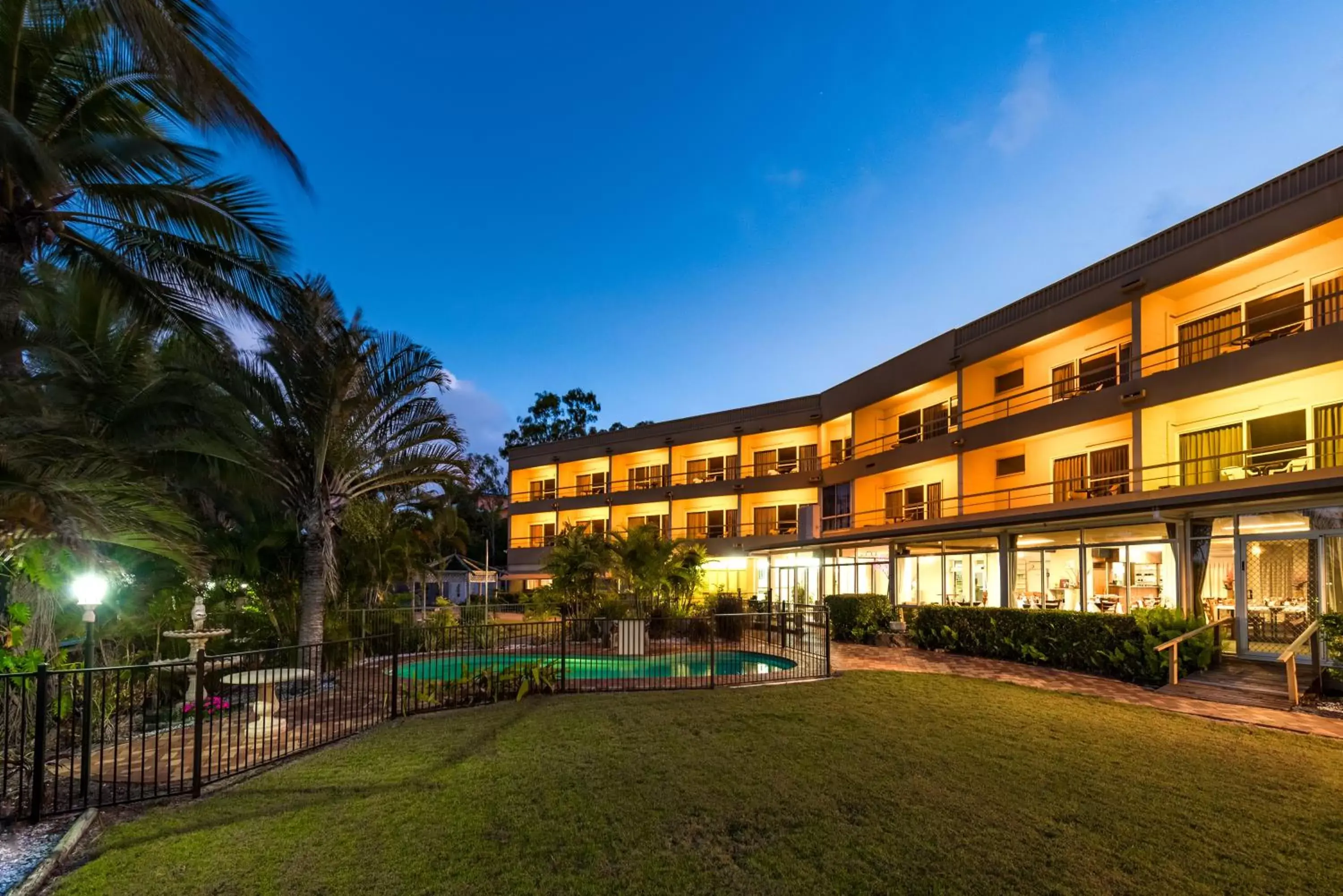 Garden view, Property Building in Camelot Motel