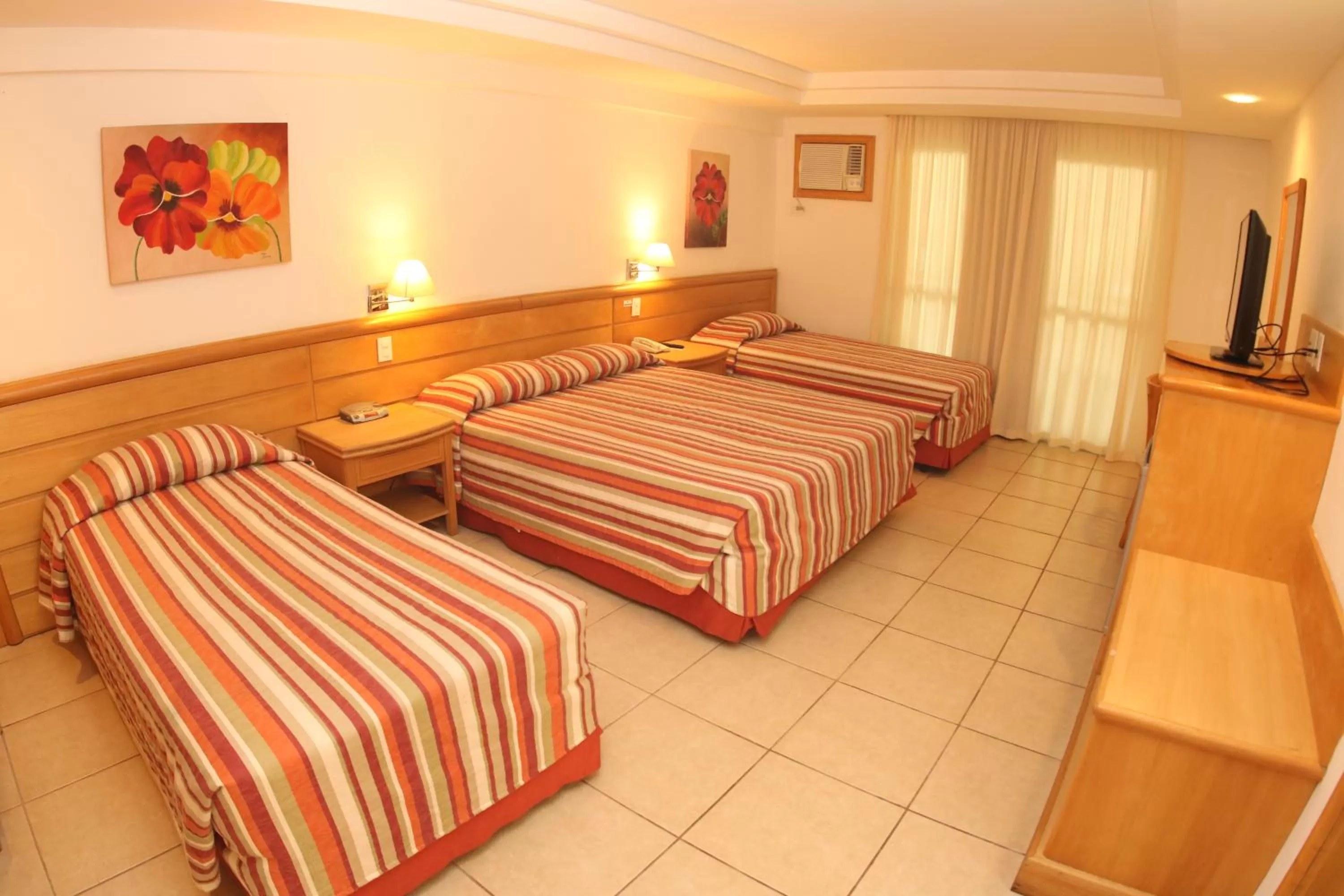 Bed in Hotel Atlântico Búzios Convention