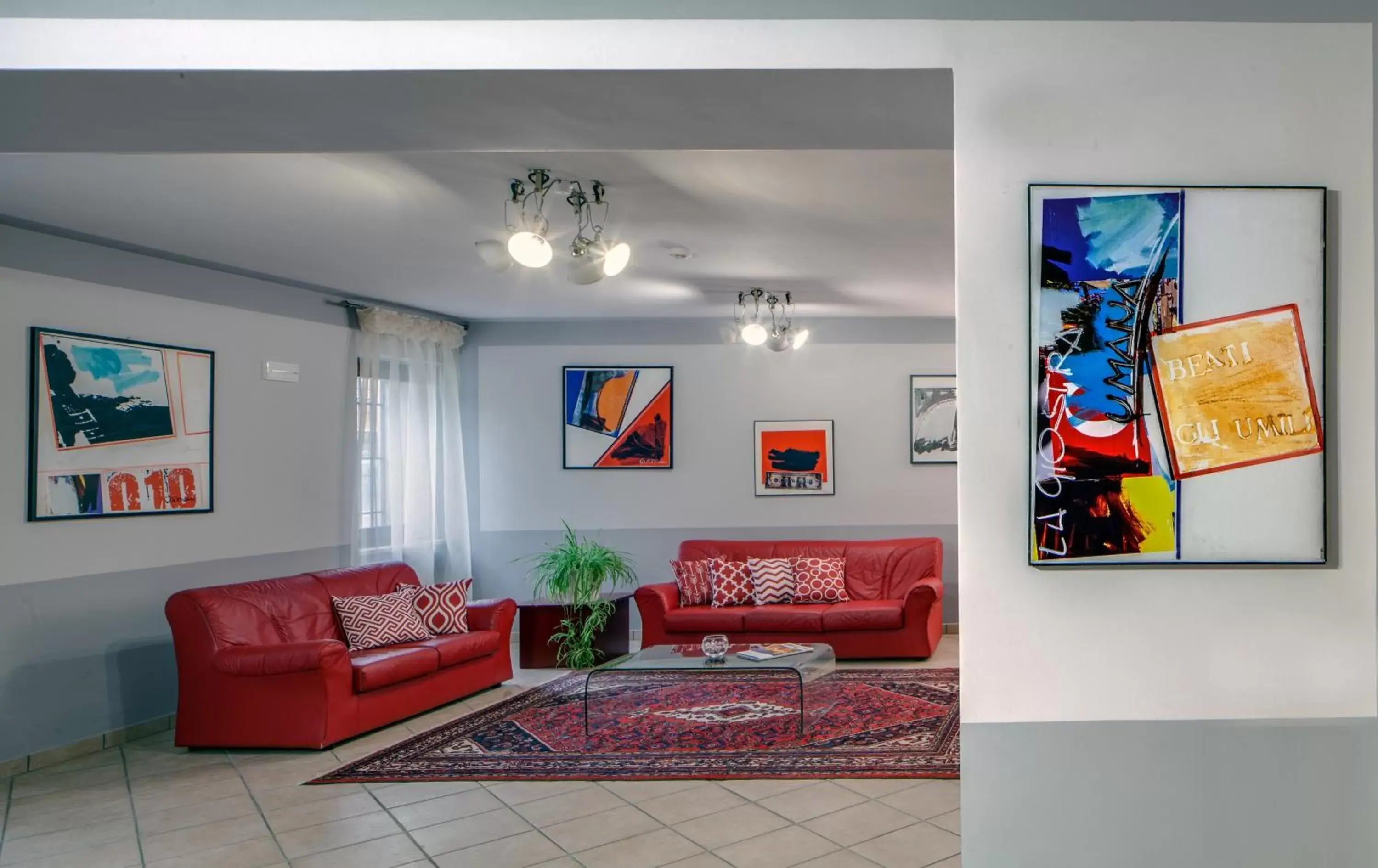 Communal lounge/ TV room, Seating Area in Hotel Gattopardo