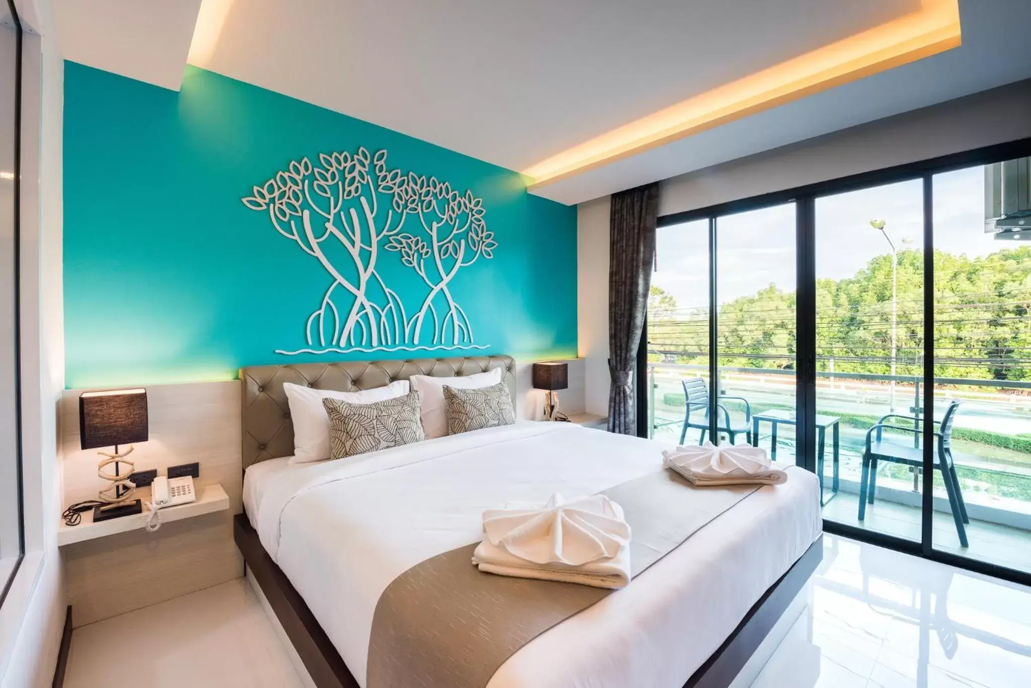 Bed in River Front Krabi Hotel