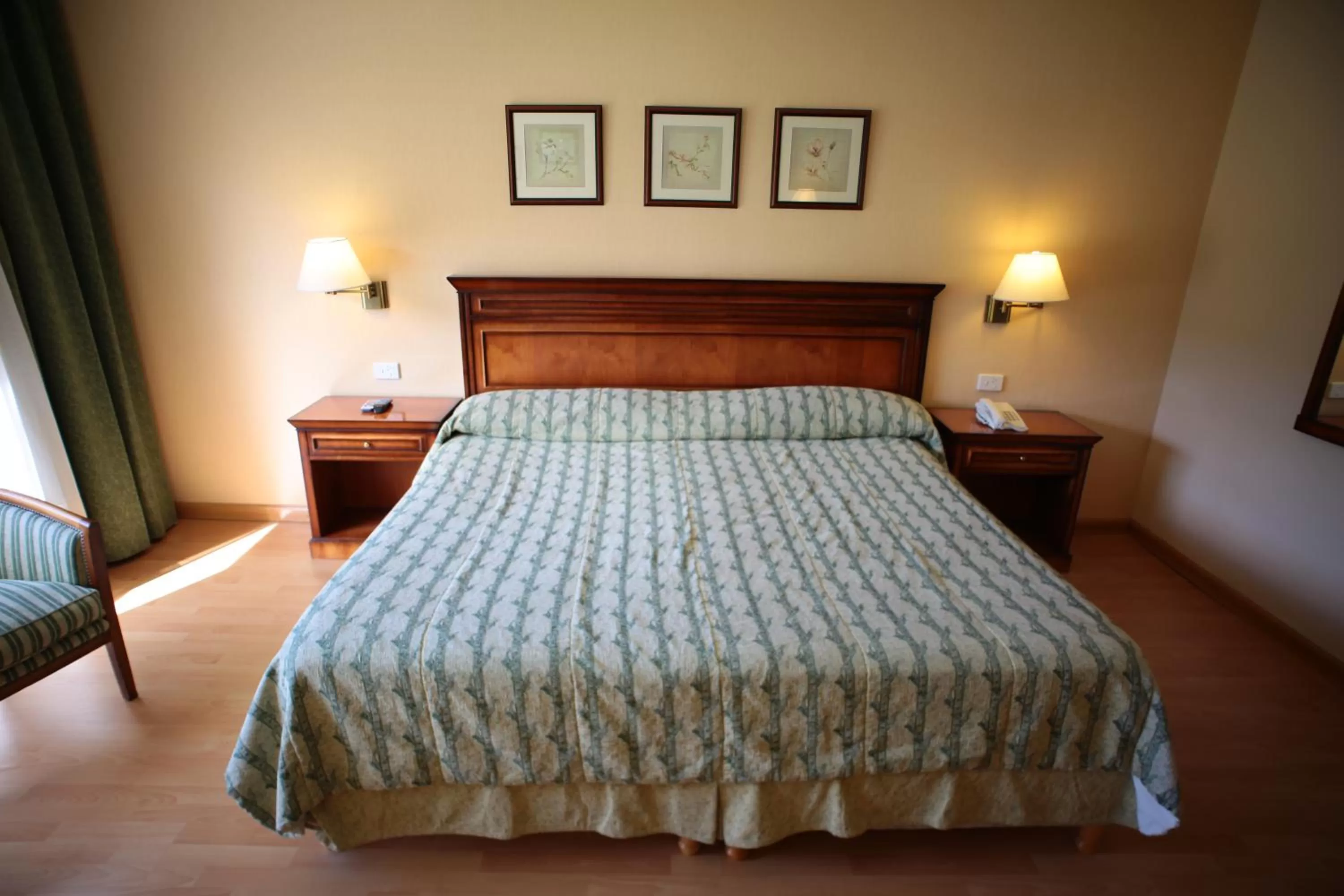 Bed in Howard Johnson Hotel & Spa Villa General Belgrano