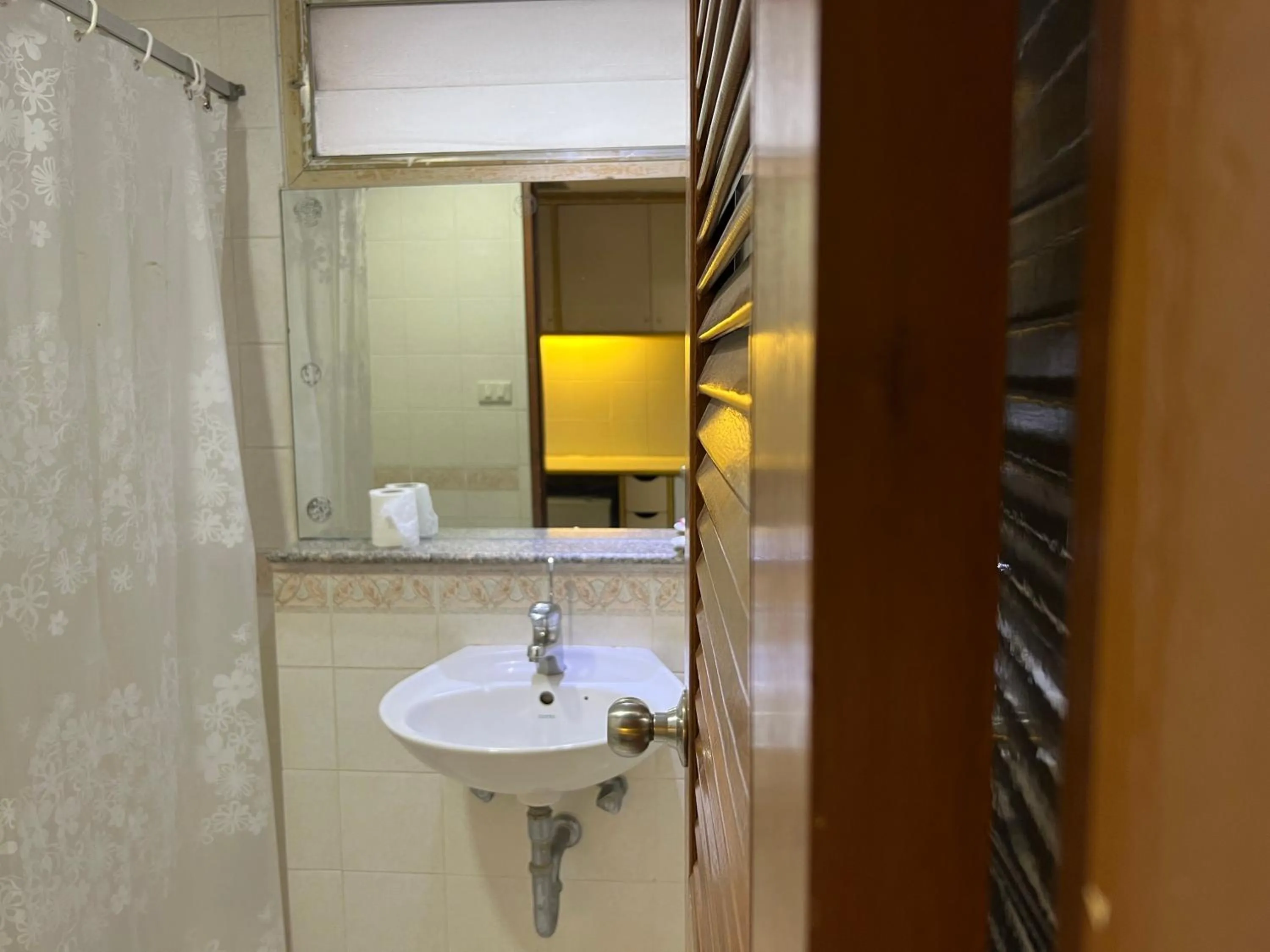 Bathroom in Mall Suites Hotel