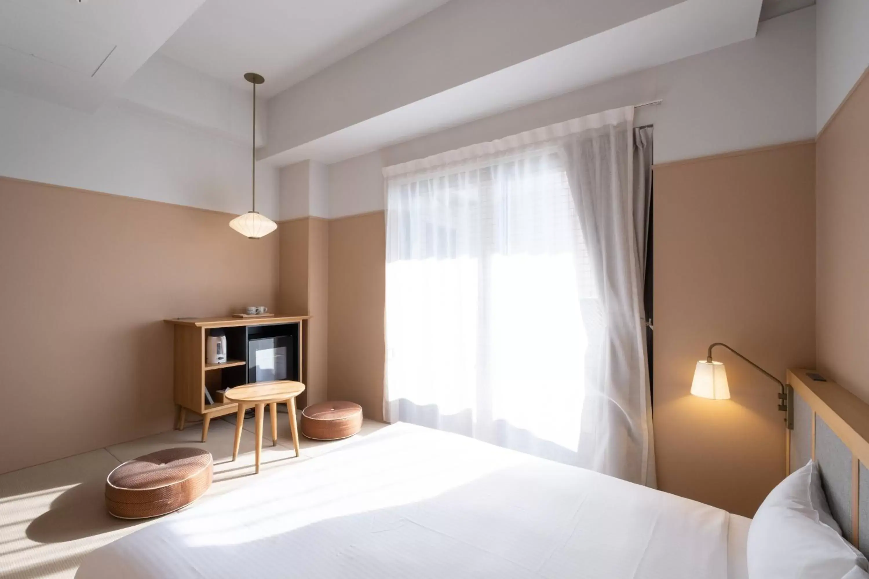 Photo of the whole room, Bed in RAKURO Kyoto by THE SHARE HOTELS