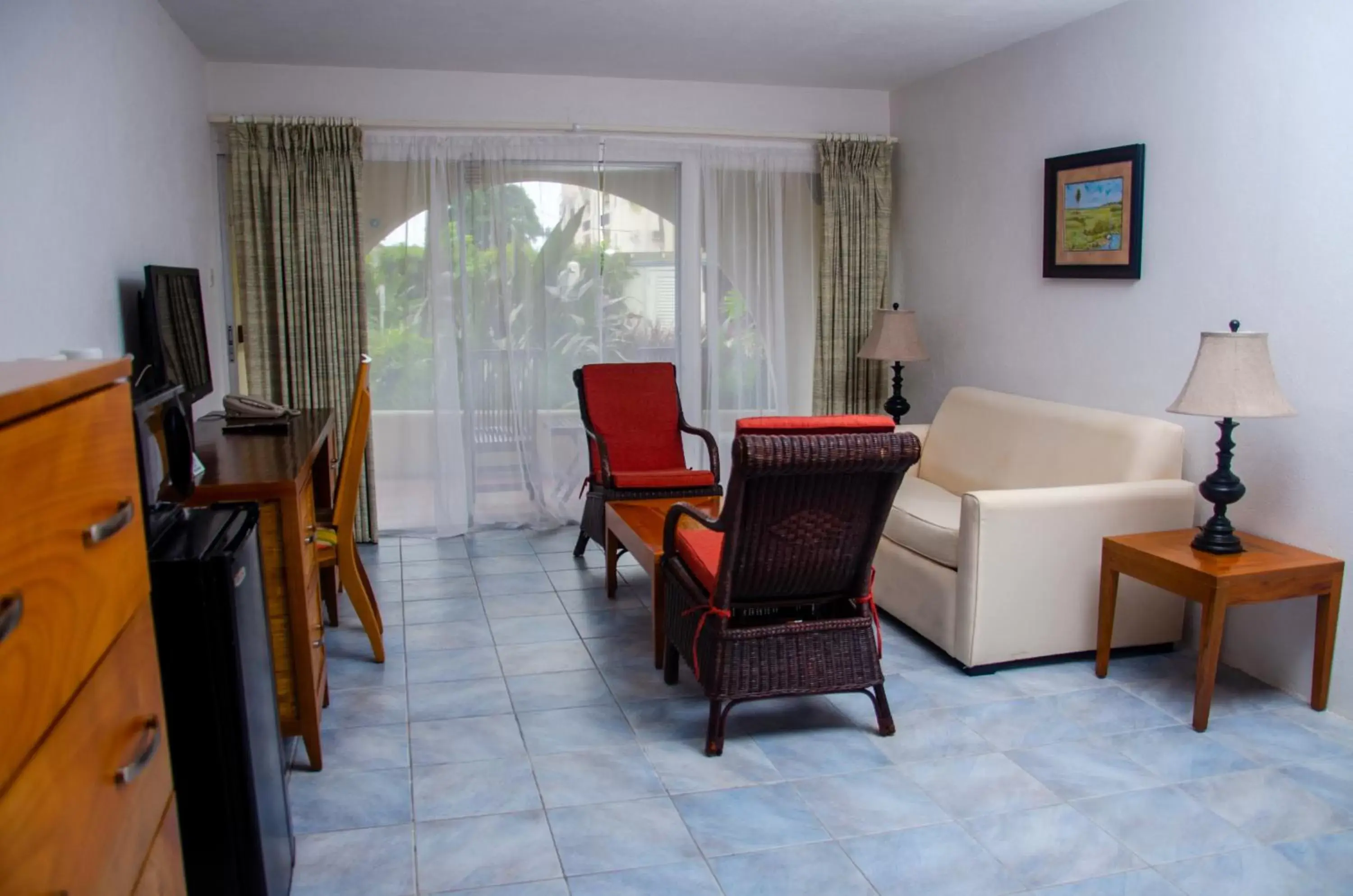 Communal lounge/ TV room, Seating Area in Infinity on the Beach