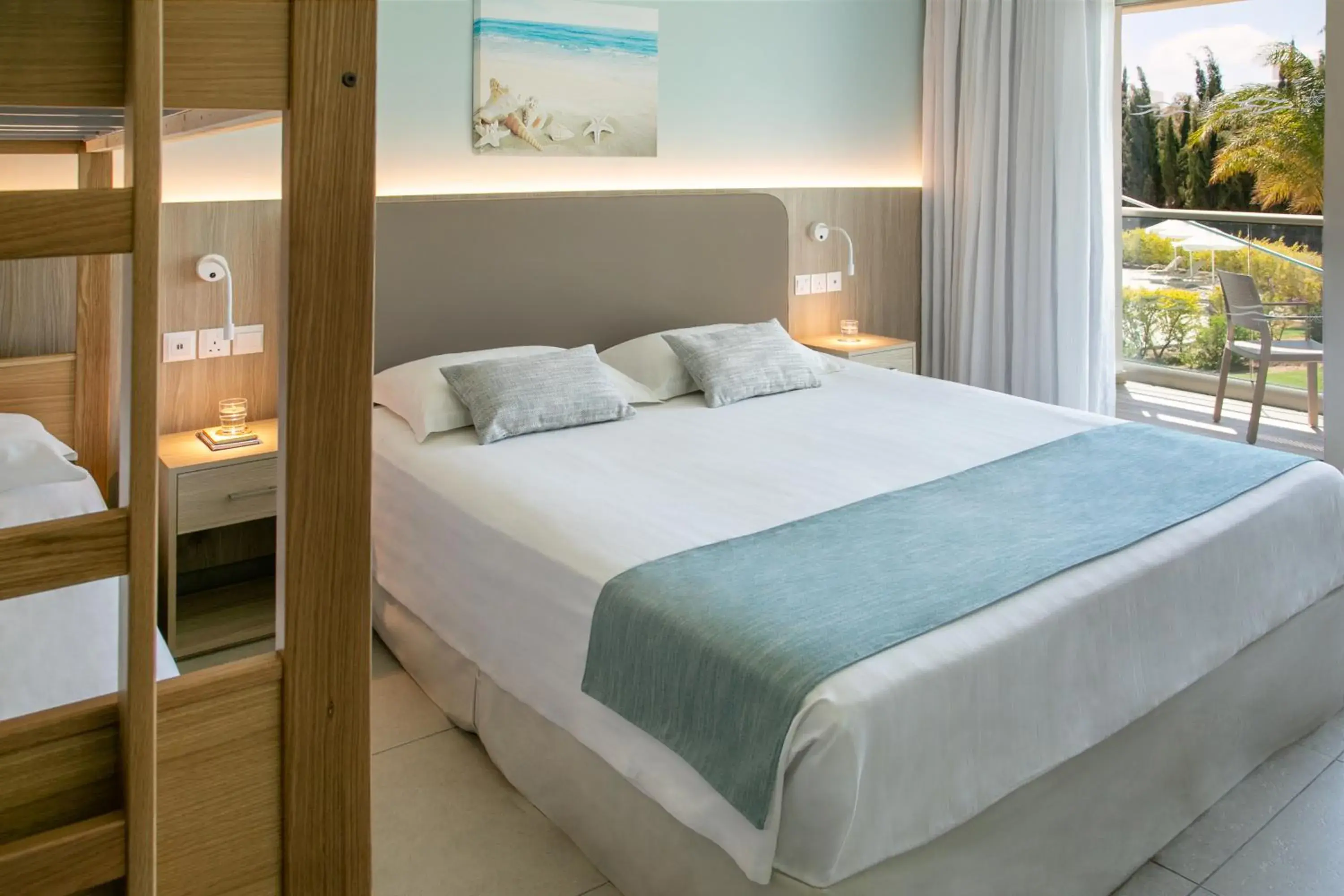 Bed in Asterias Beach Hotel