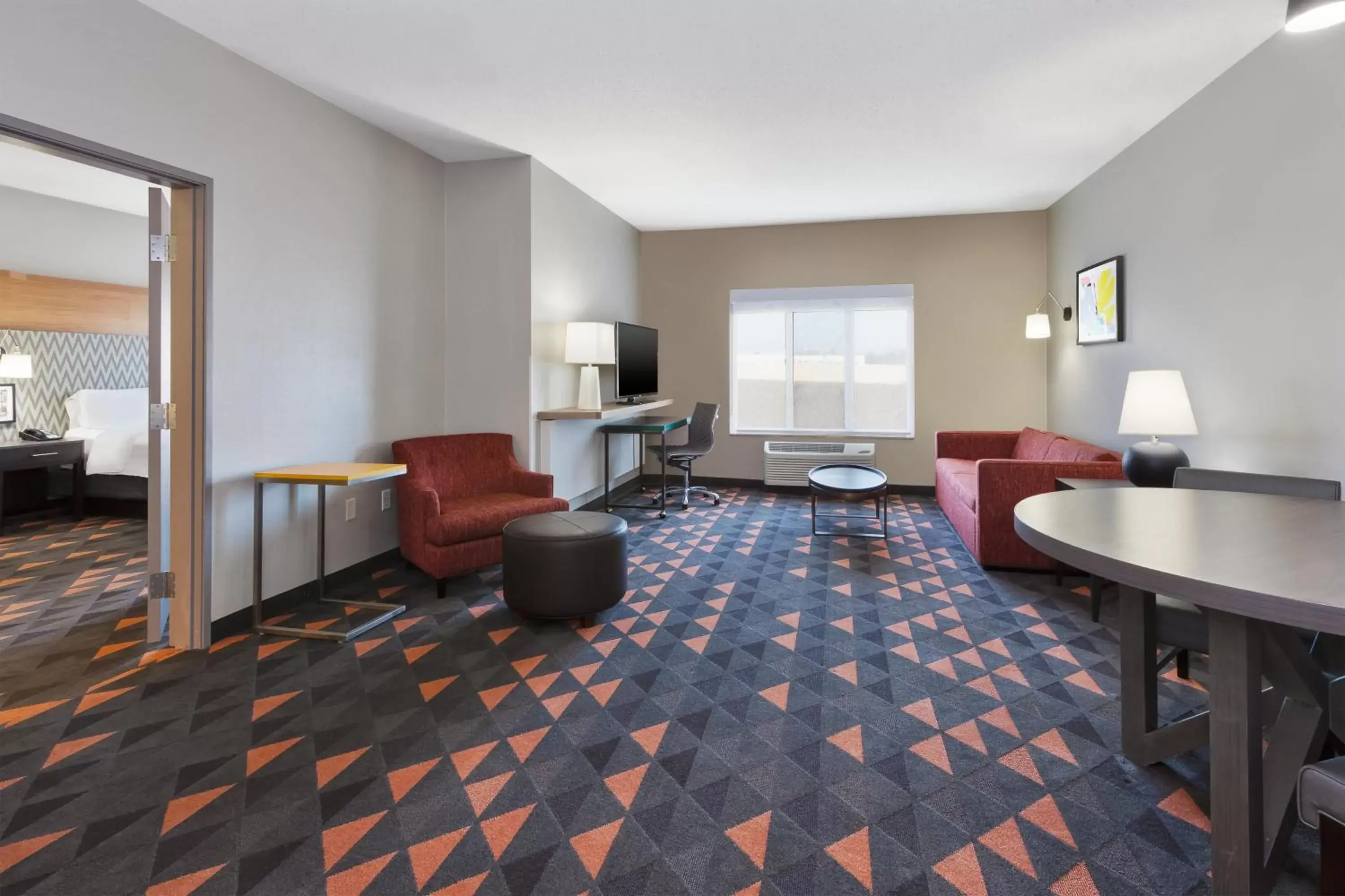 Photo of the whole room, Seating Area in Holiday Inn Grand Rapids - South, an IHG Hotel