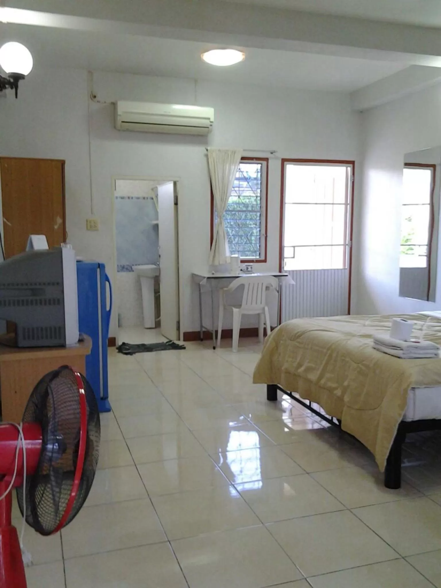 Bed in Pikul Apartment Hotel