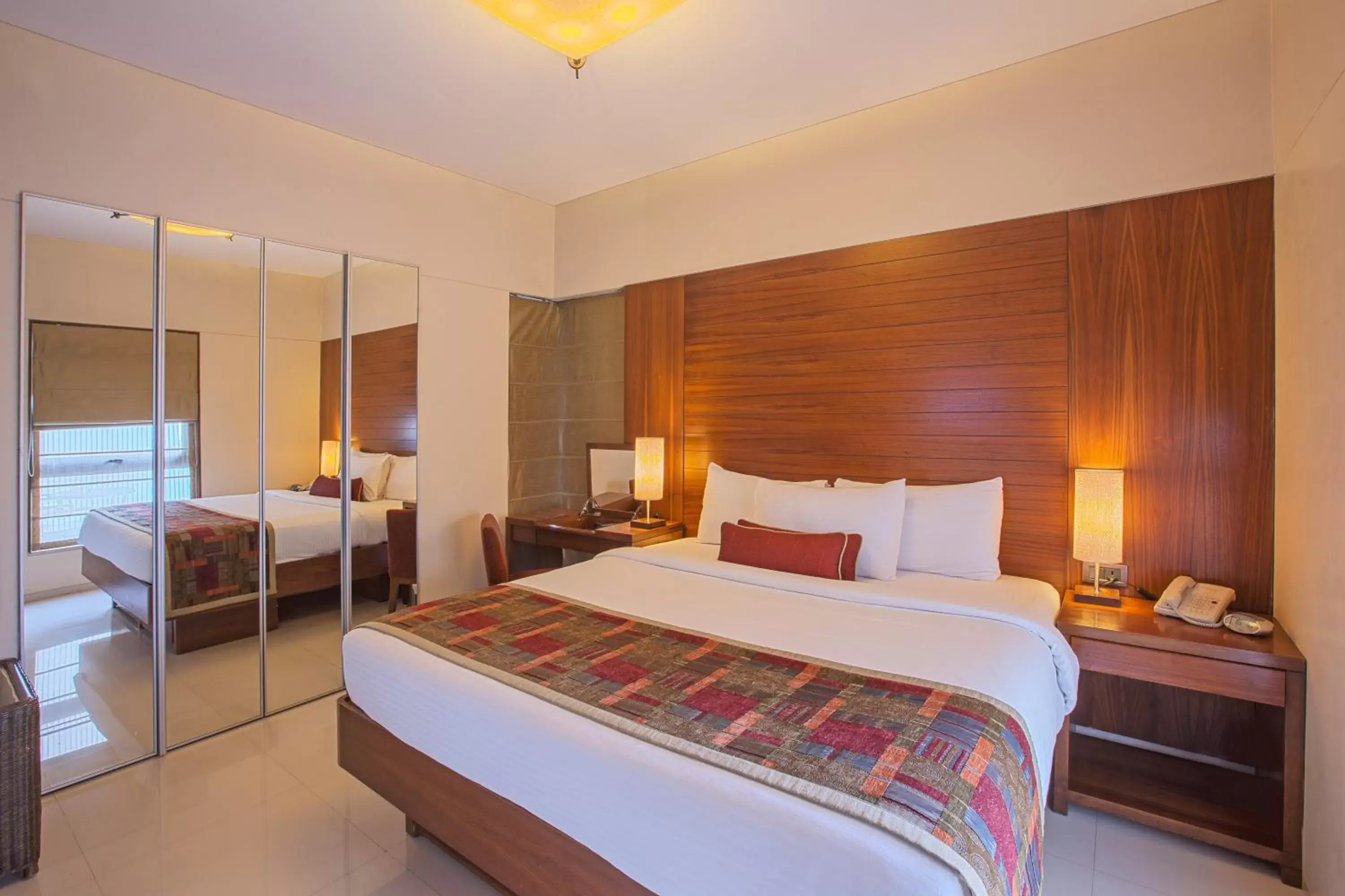Bedroom, Bed in Oakwood Residence Naylor Road Pune