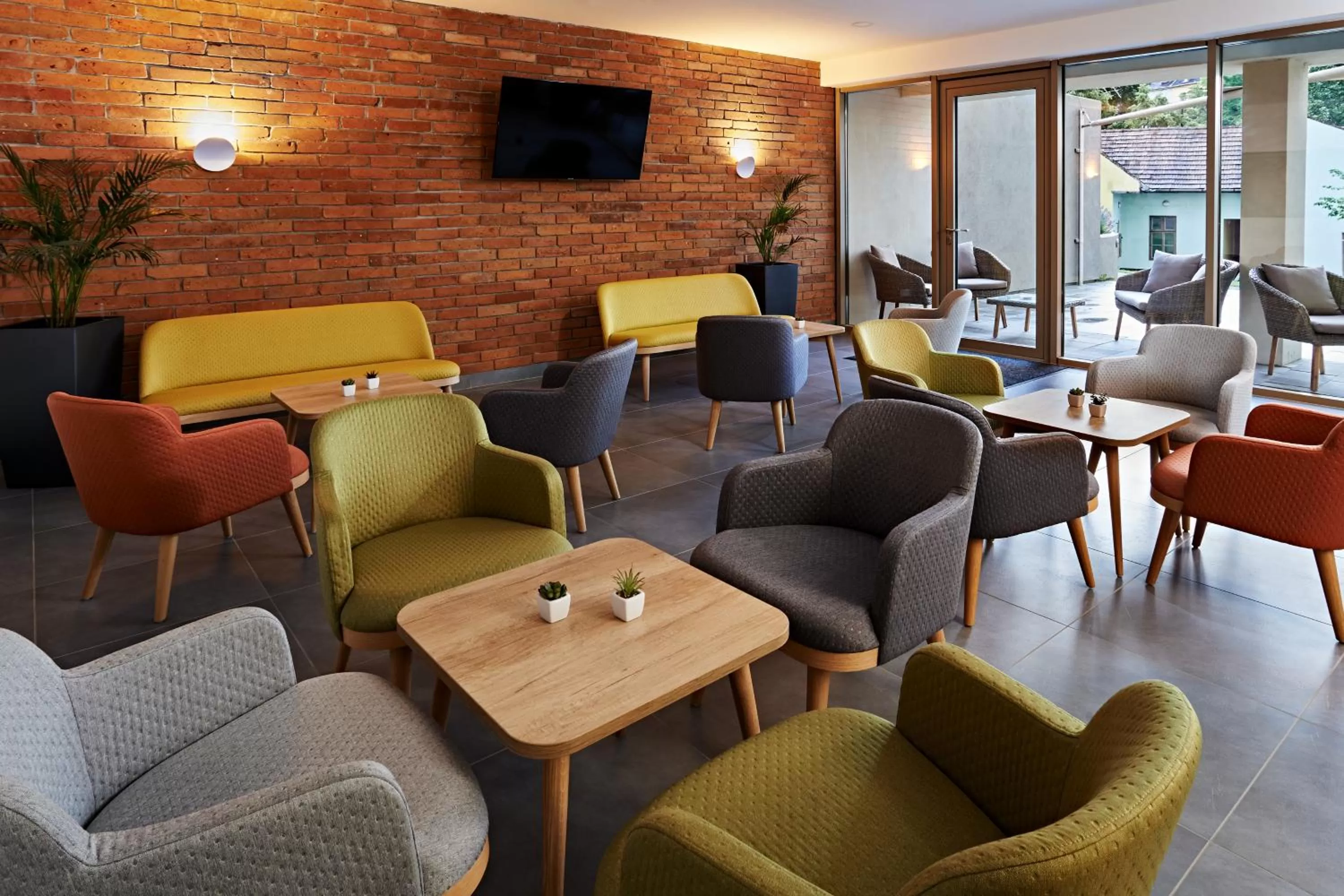 Lounge or bar in Hotel Adalbert Szent Tamás ház