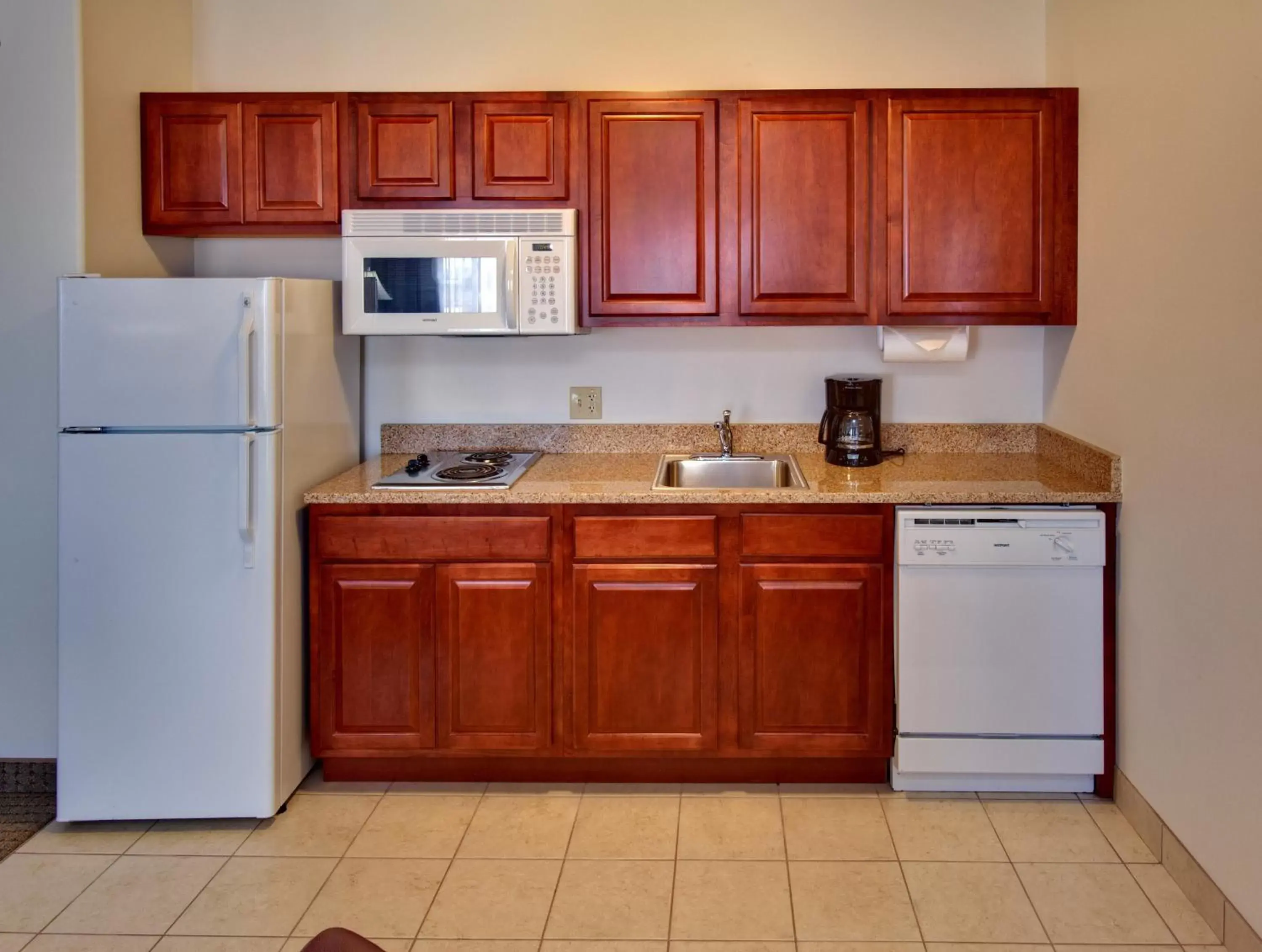 Photo of the whole room, Kitchen/Kitchenette in Staybridge Suites Rockford, an IHG Hotel