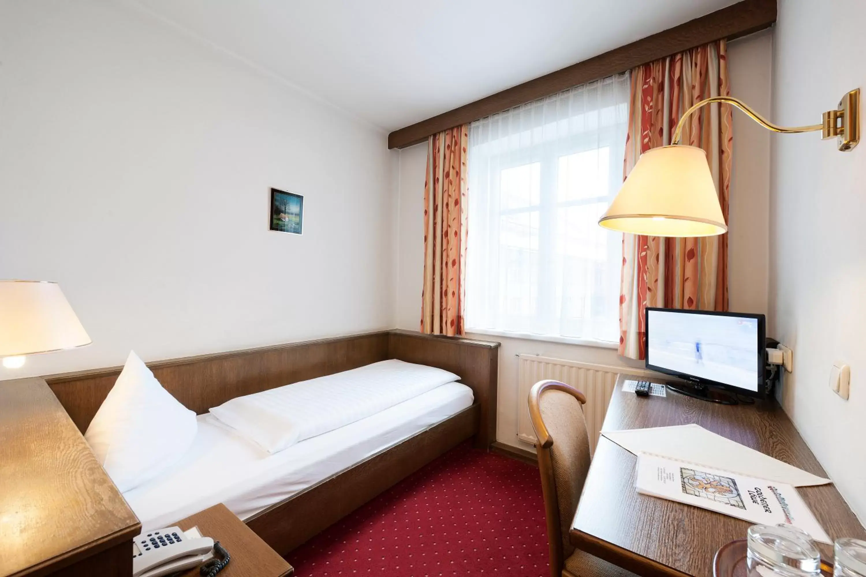 Photo of the whole room, Bed in Hotel Goldener Löwe