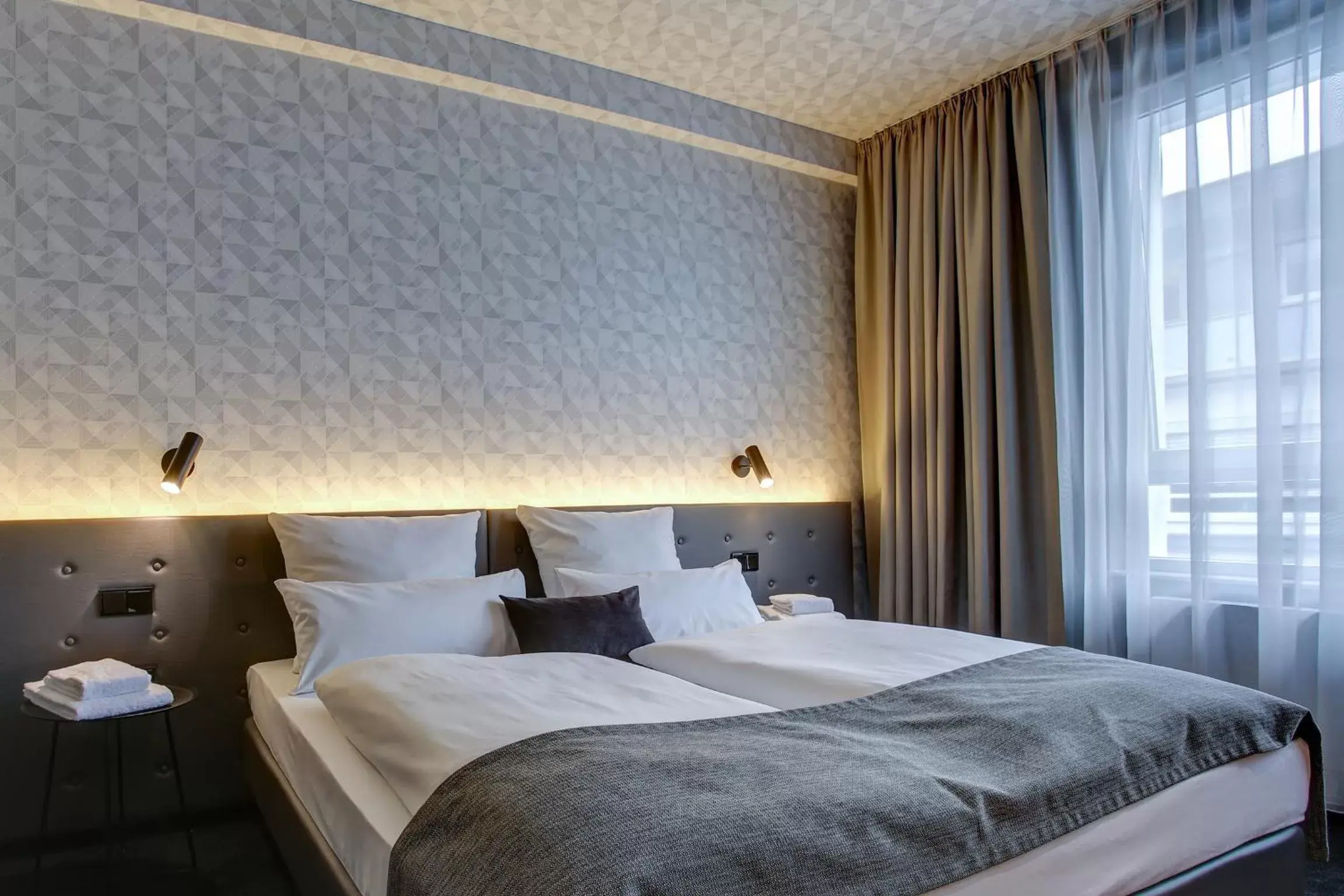 Photo of the whole room, Bed in NYCE Hotel Dortmund City