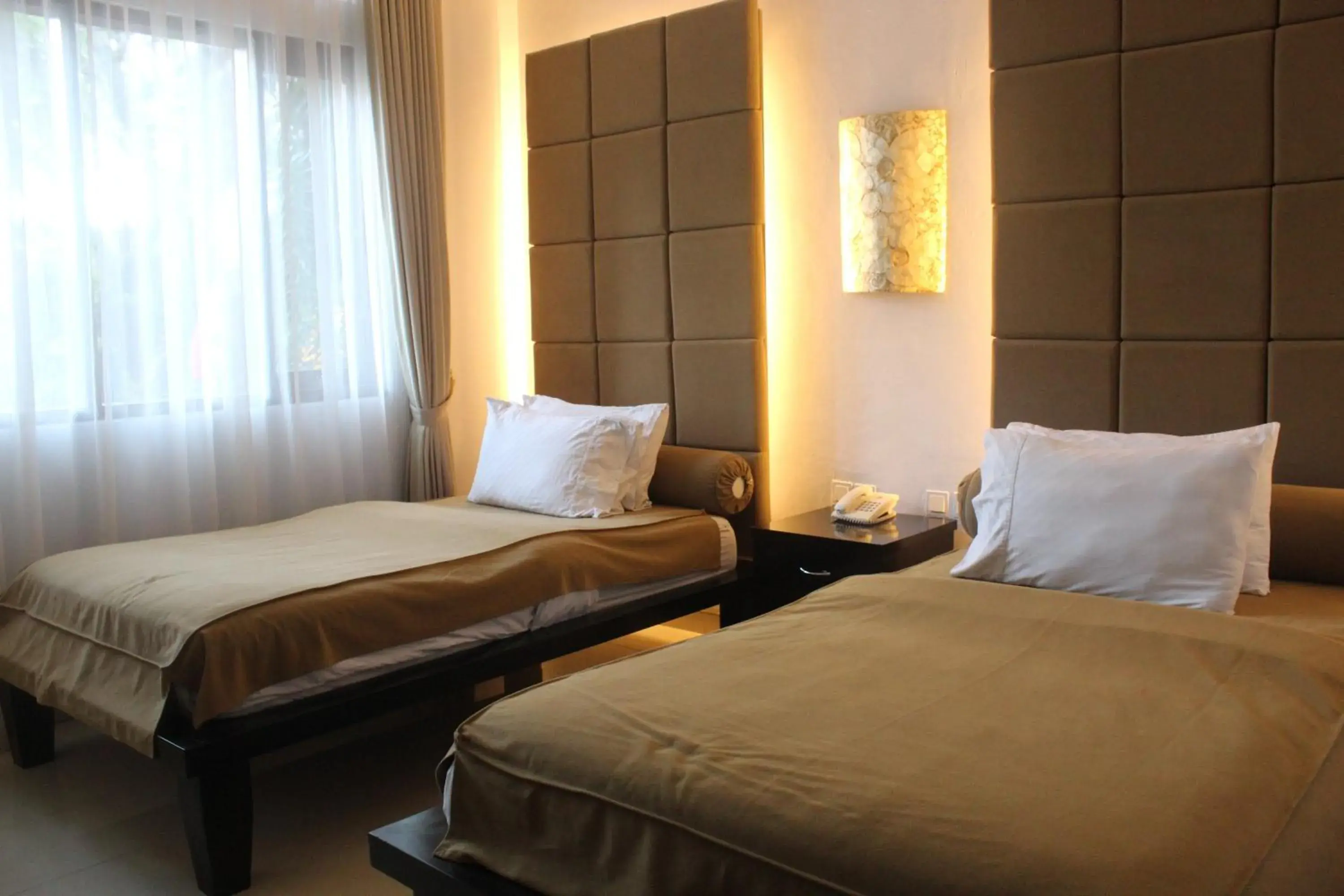 Bed in The Radiant Hotel & Spa