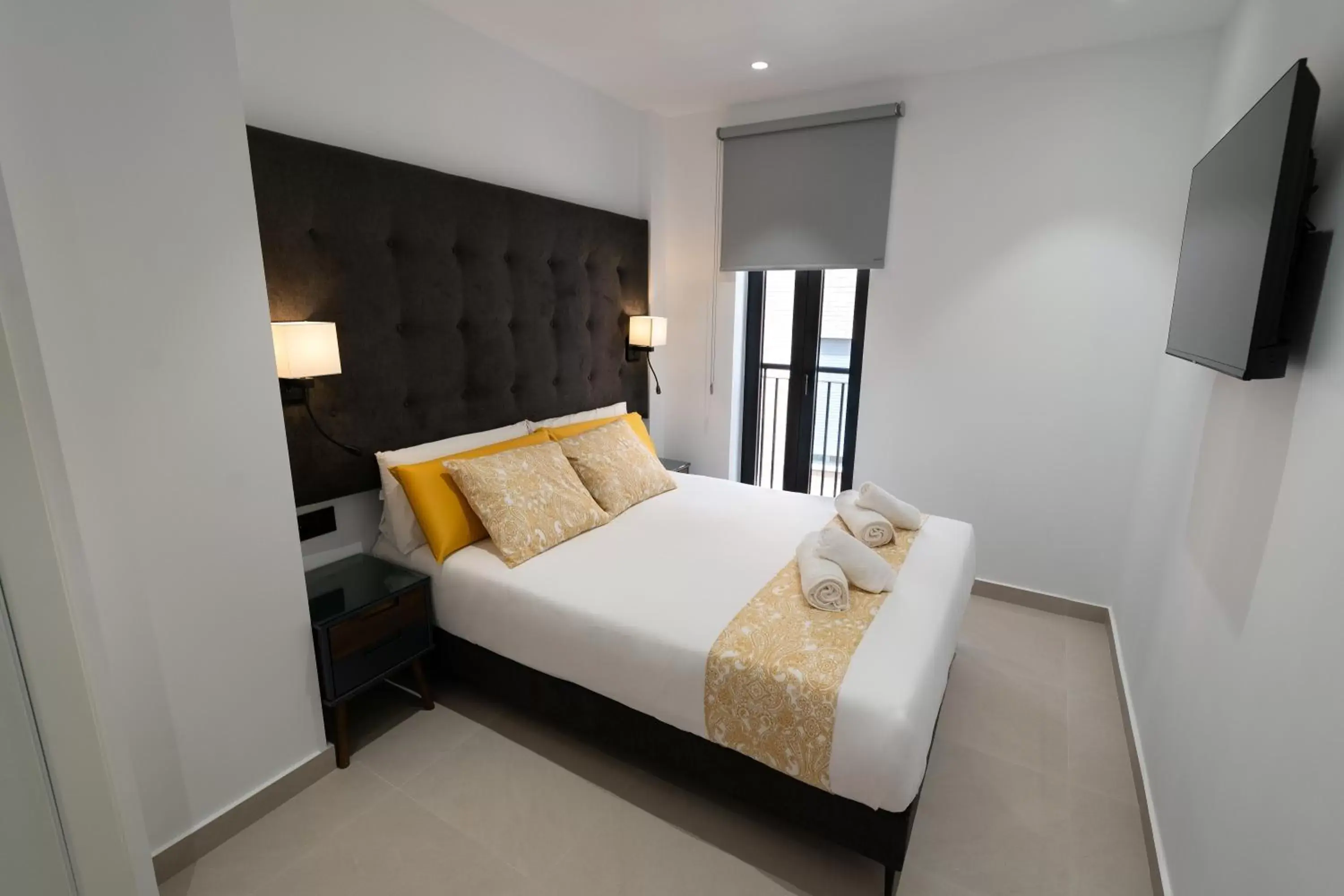 Bedroom in Suites Puerto Valencia