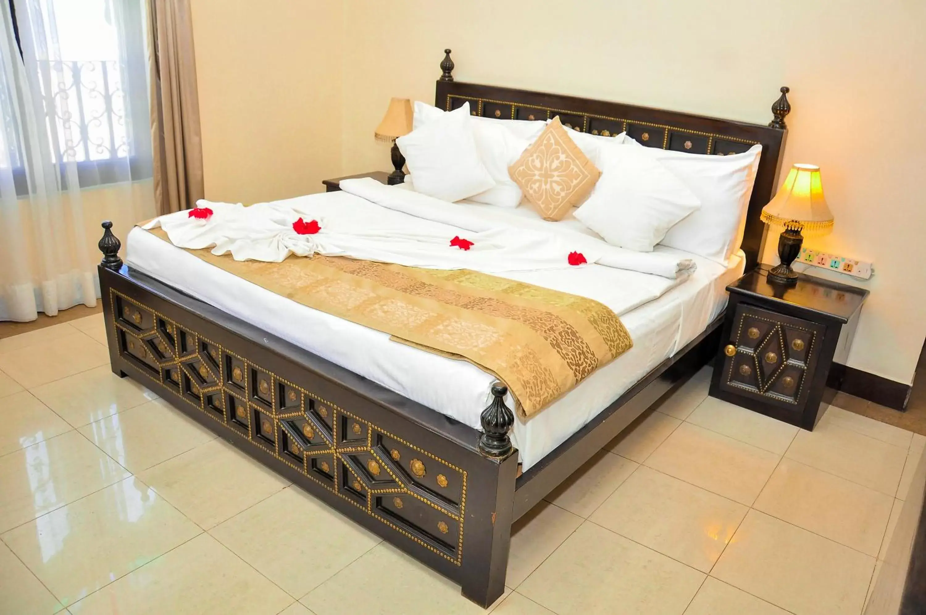 Bed in Golden Tulip Stone Town Boutique