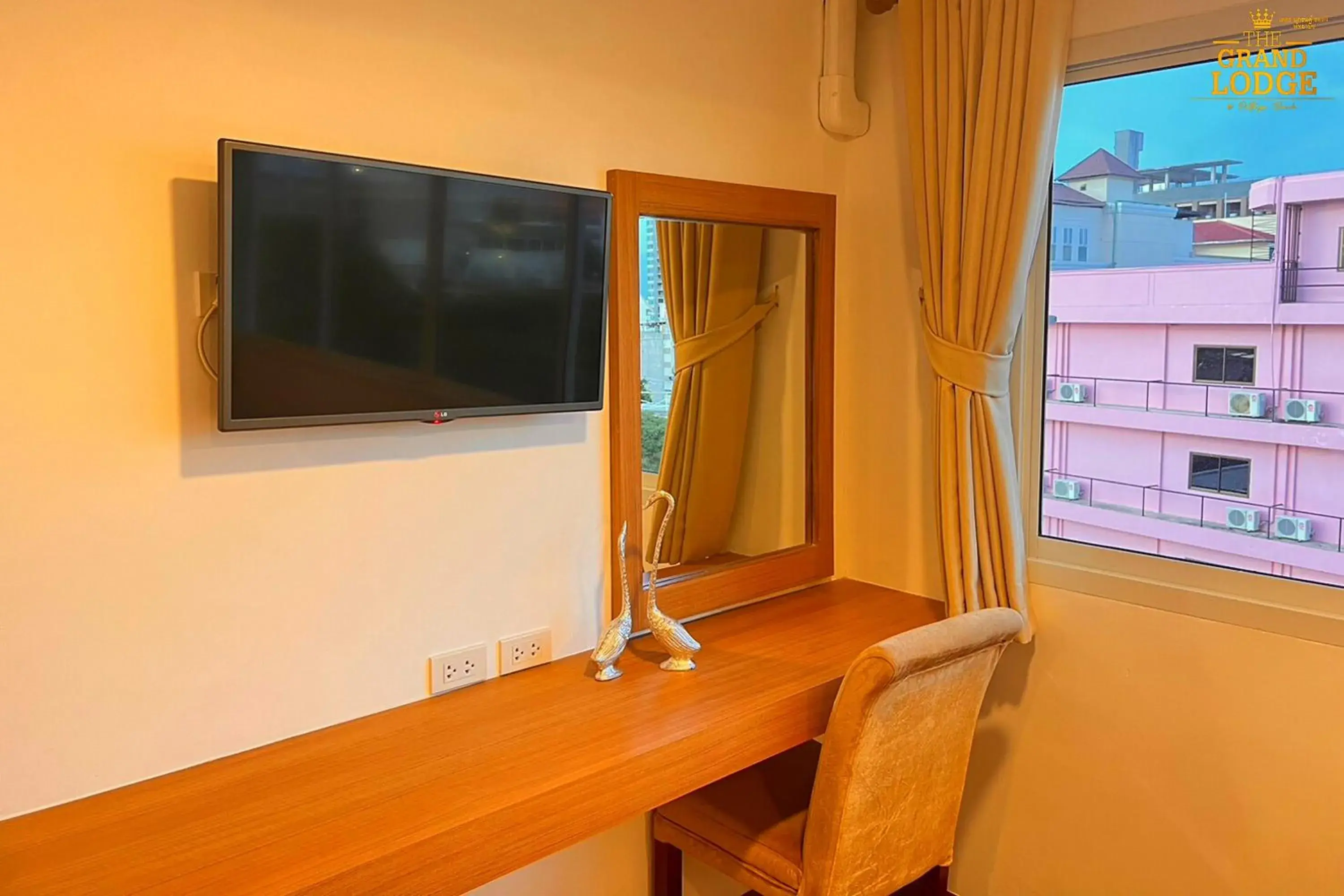 Bedroom, TV/Entertainment Center in The Privi Hotel