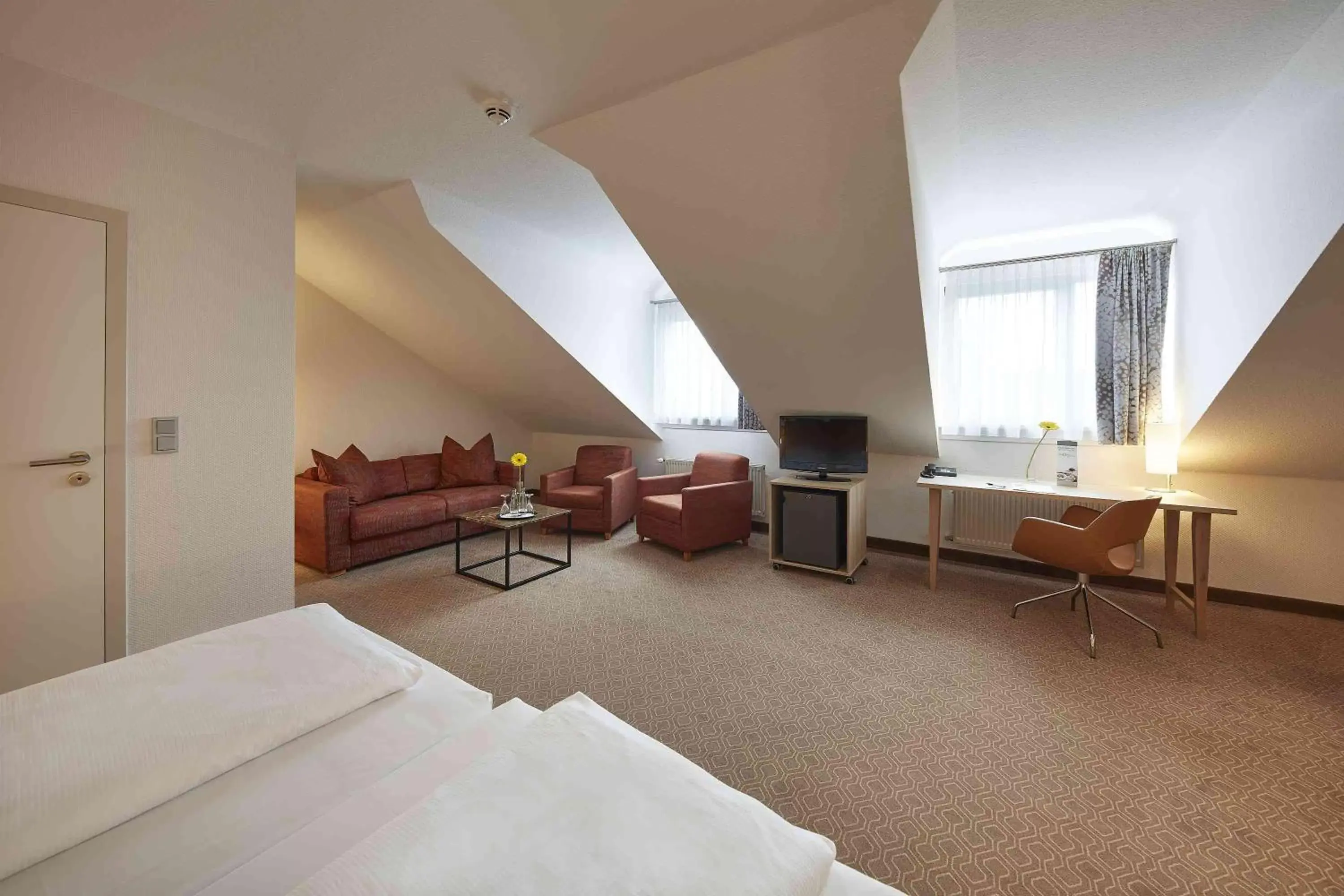 Bedroom, Seating Area in GHOTEL hotel & living Kiel