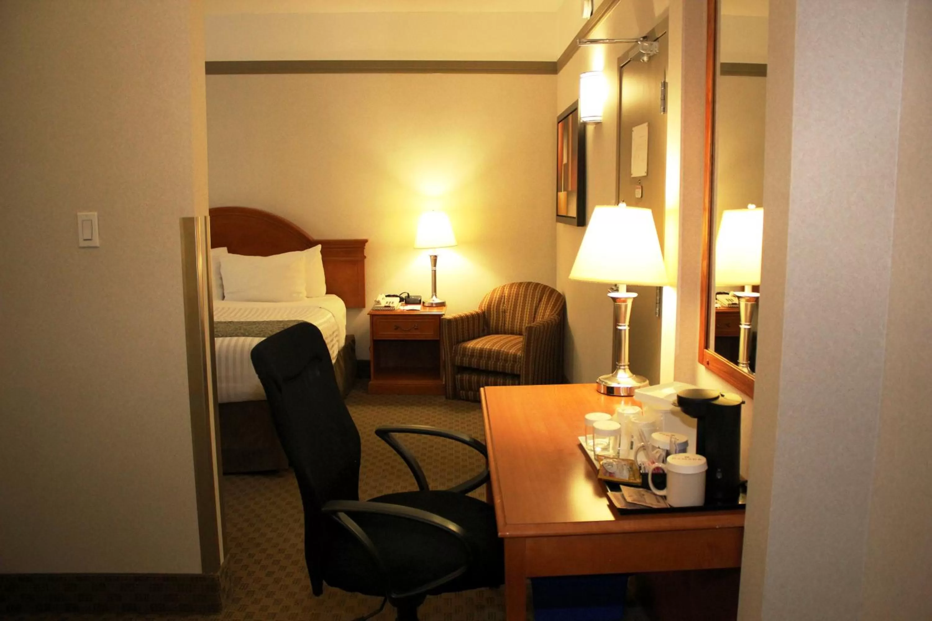 Photo of the whole room, Bed in Ramada by Wyndham Edmonton South