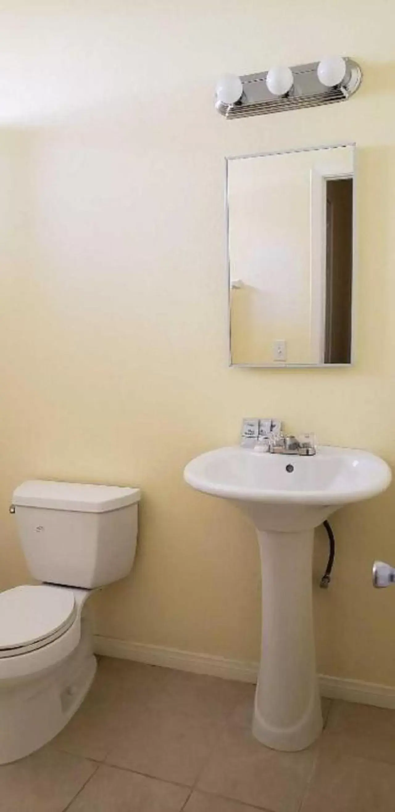 Bathroom in Europa Inn & Suites