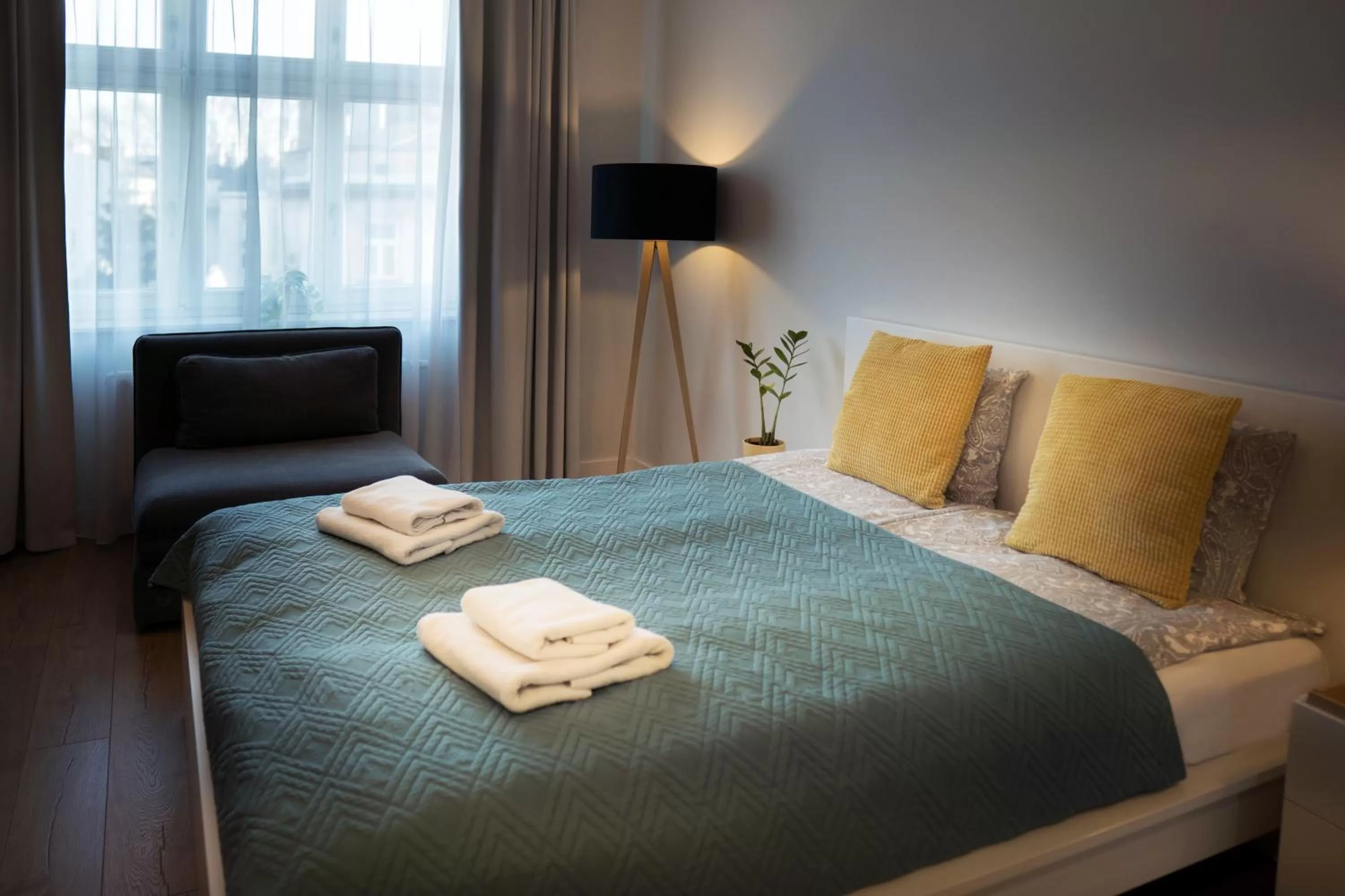 Bed in Riverside Aparthotel Cracow