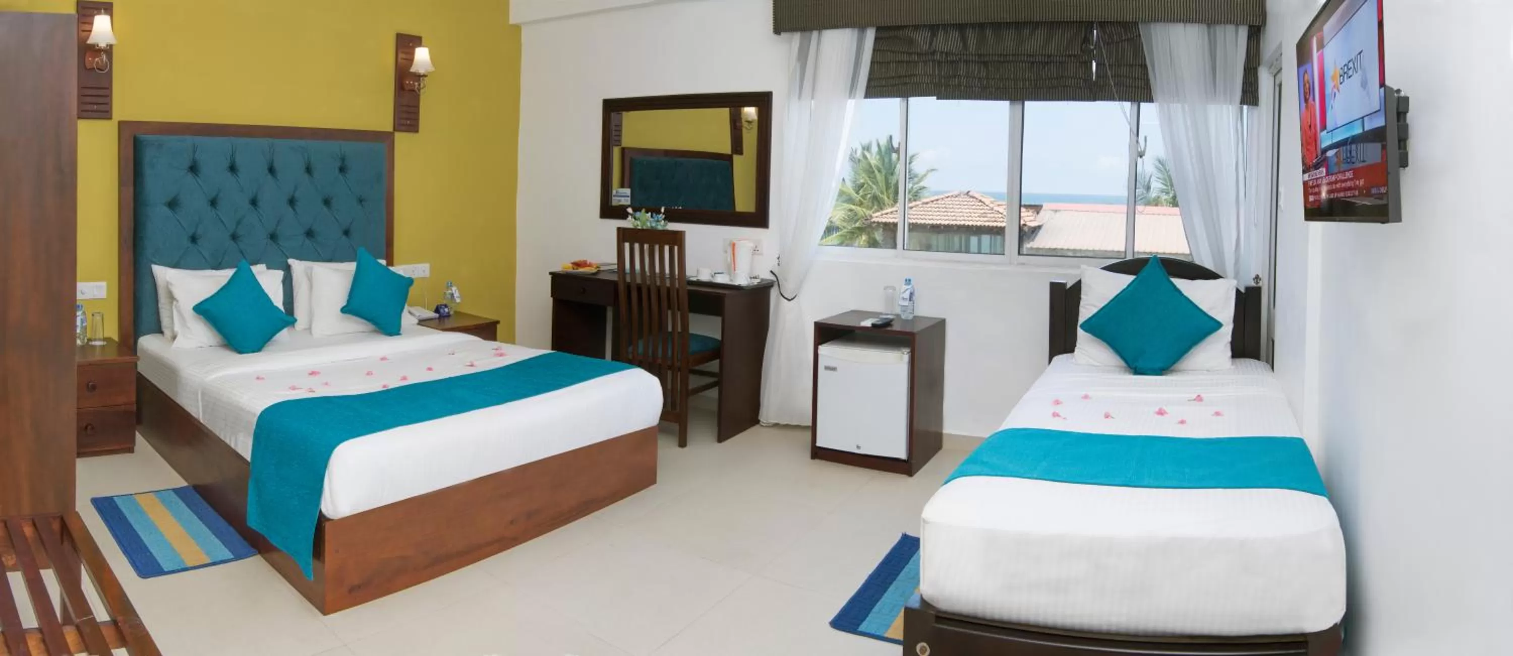 Bed in Mount Breeze Hotel