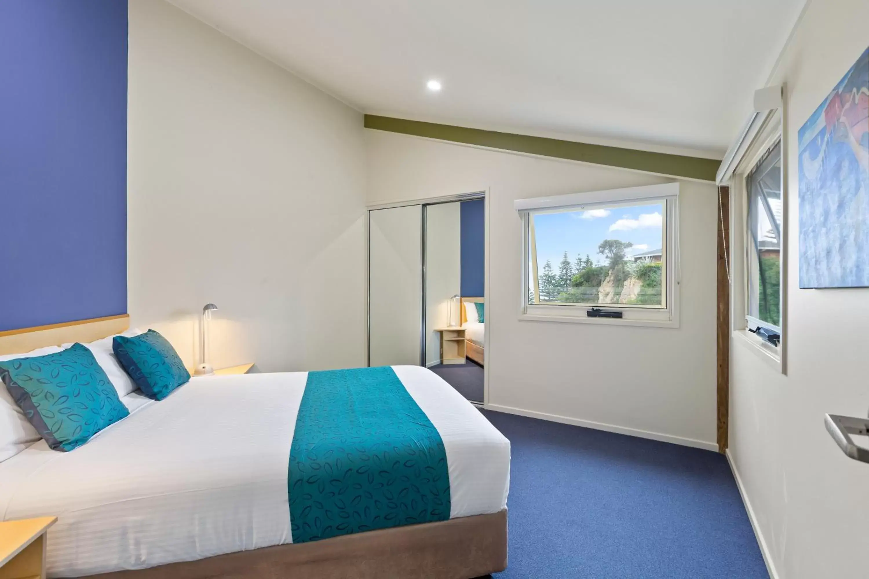 Bed in Tathra Beach House Holiday Apartments