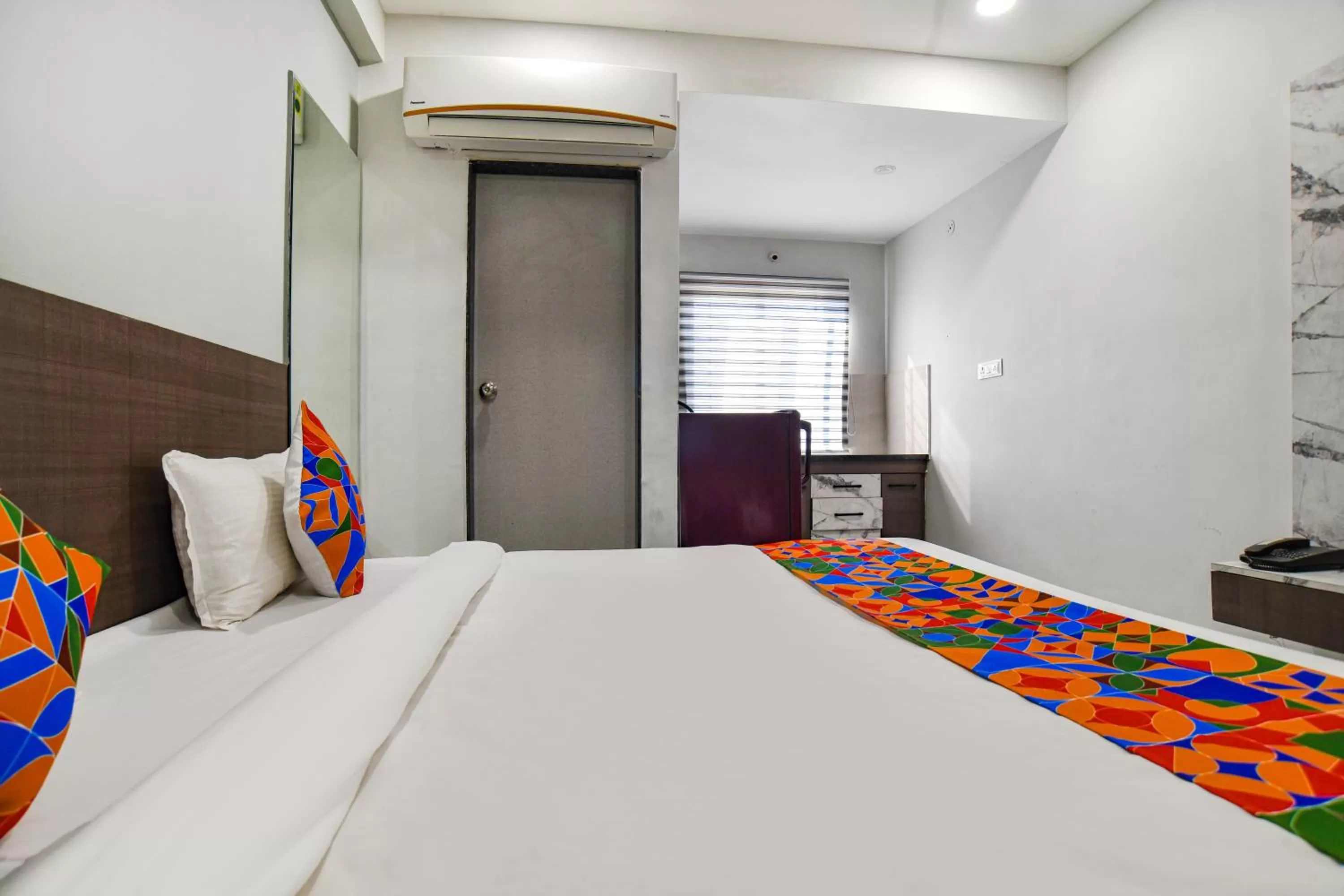 Photo of the whole room, Bed in Fabhotel Grand Blue