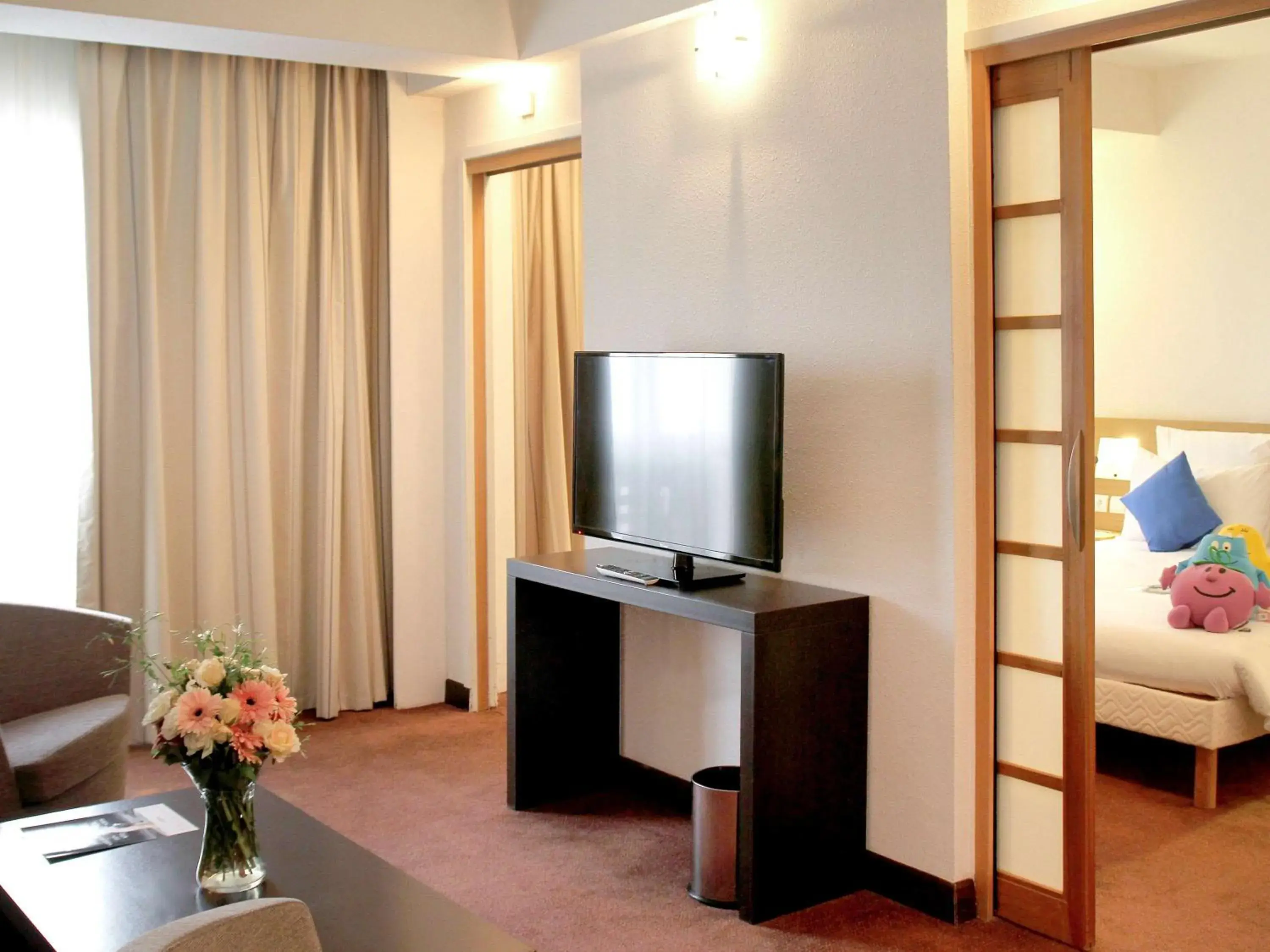 Photo of the whole room, TV/Entertainment Center in Novotel Constantine