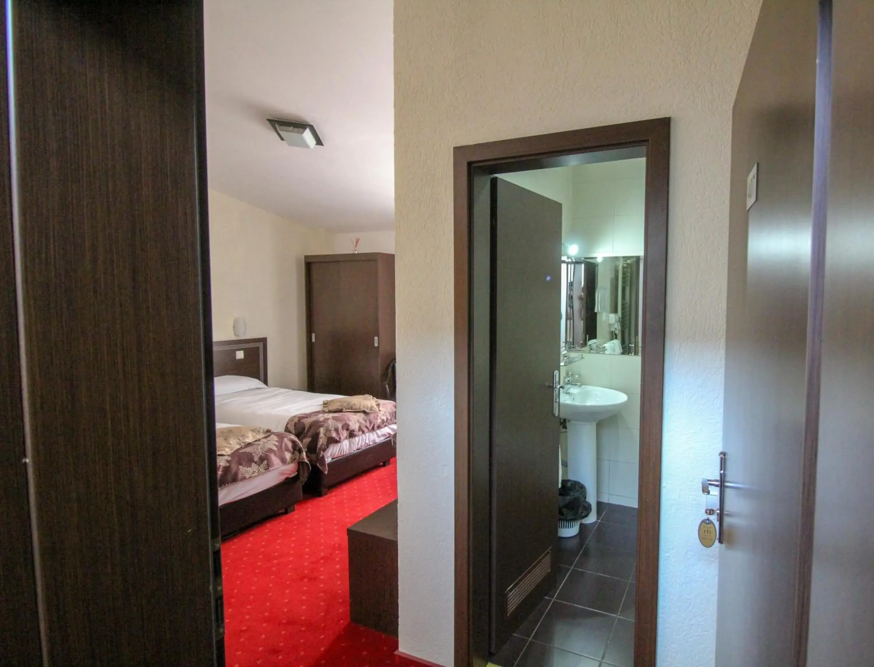 Bed, Bathroom in Hotel Razvan