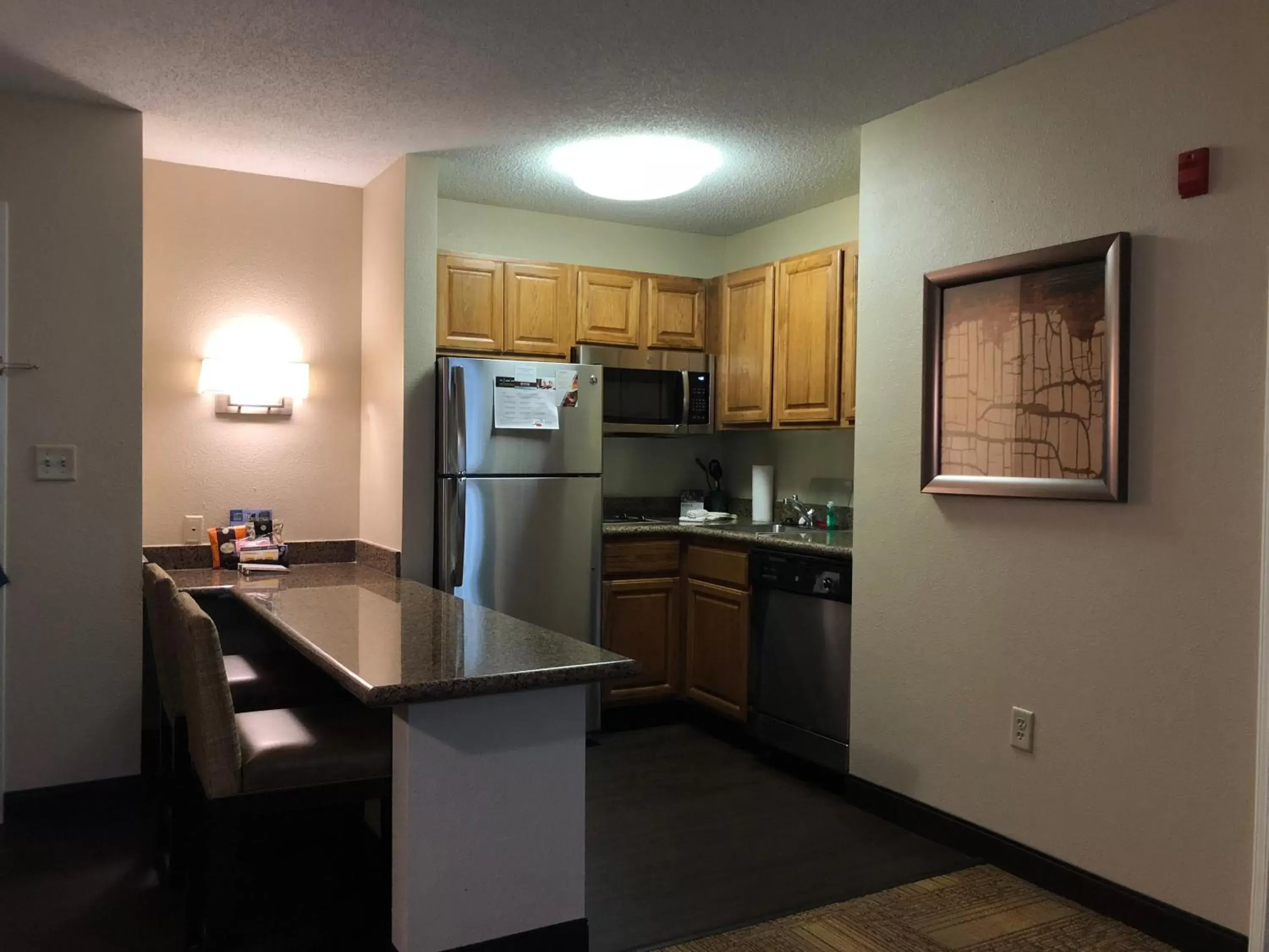 Kitchen or kitchenette, Kitchen/Kitchenette in Staybridge Suites Grand Rapids-Kentwood, an IHG Hotel