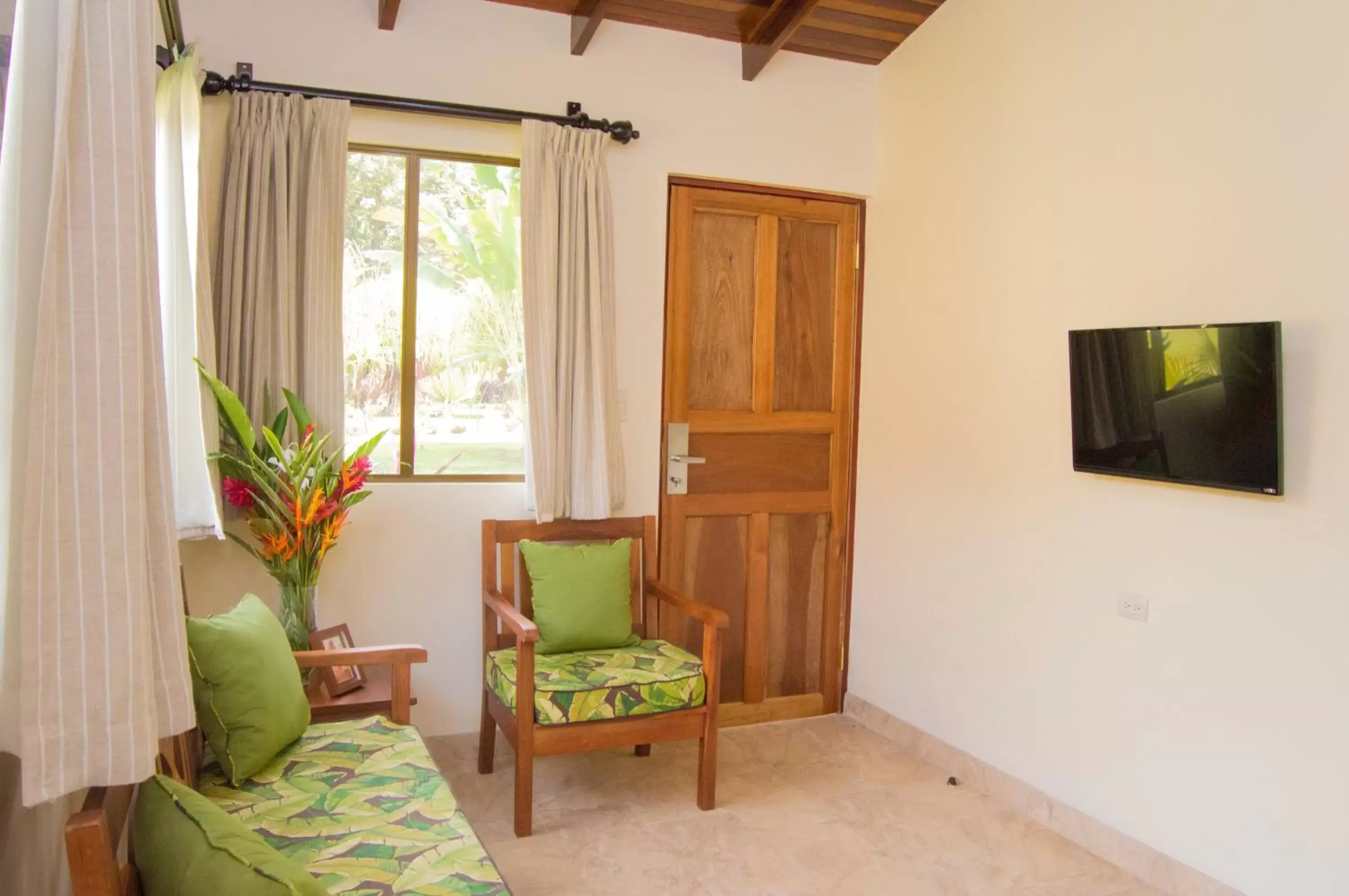 Living room, TV/Entertainment Center in La Foresta Nature Resort