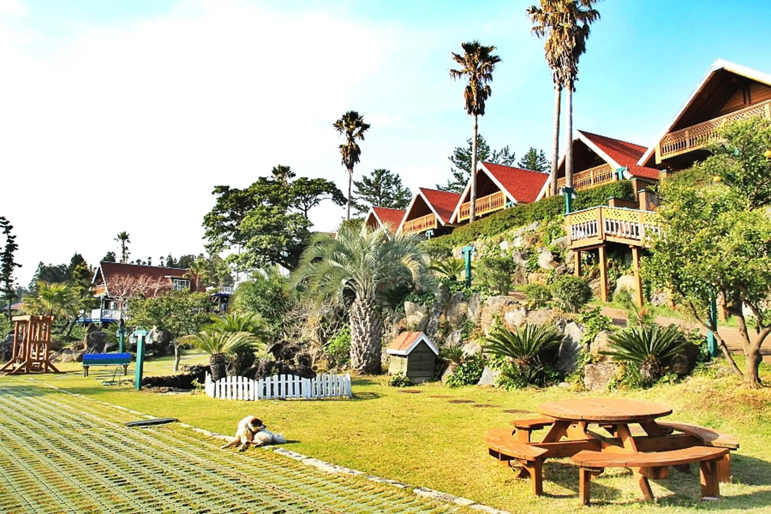 Facade/entrance in Jungmun Log Pension & Resort Facade/entrance in Jungmun Log Pension & Resort