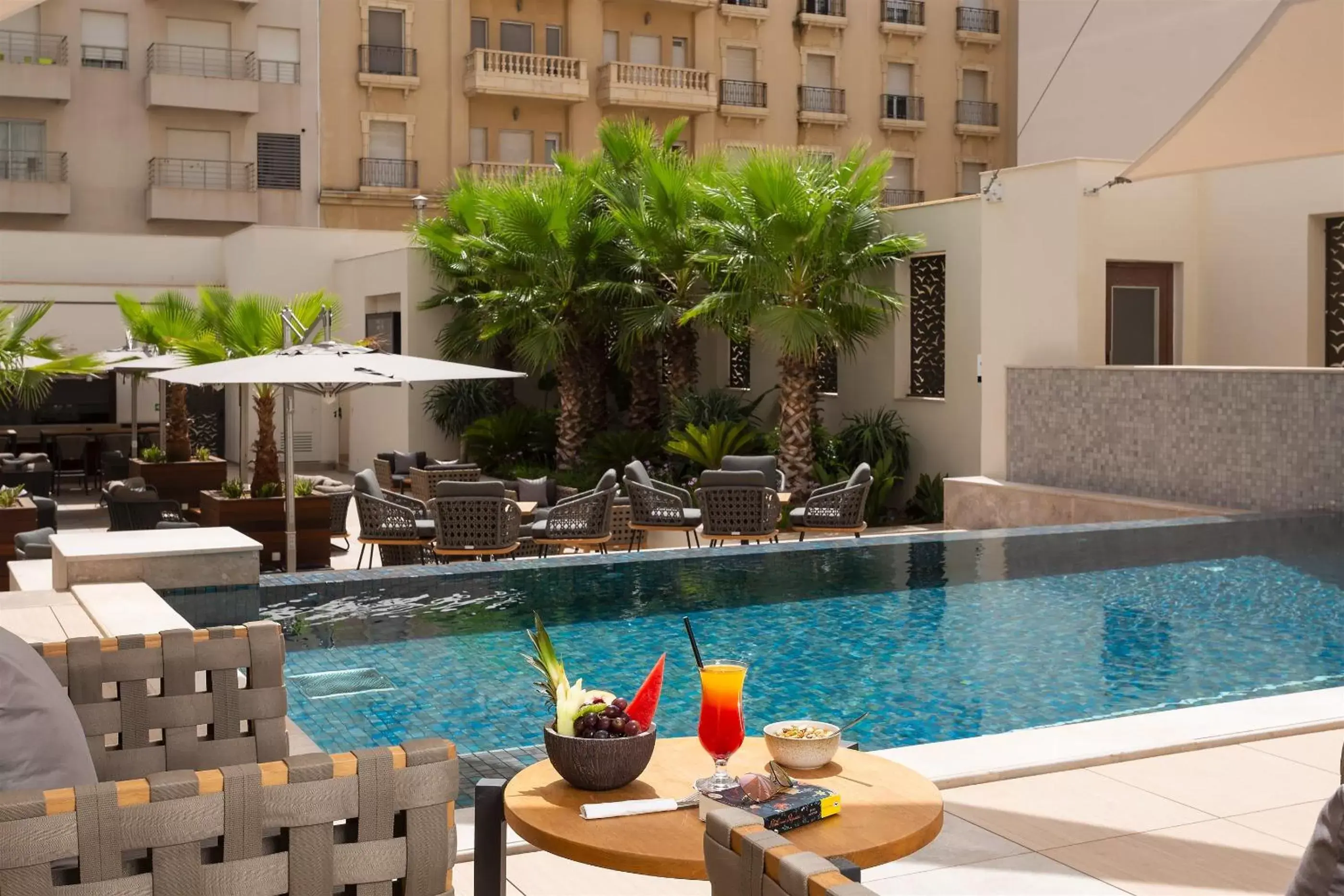 Balcony/Terrace, Swimming Pool in Novotel Tunis Lac