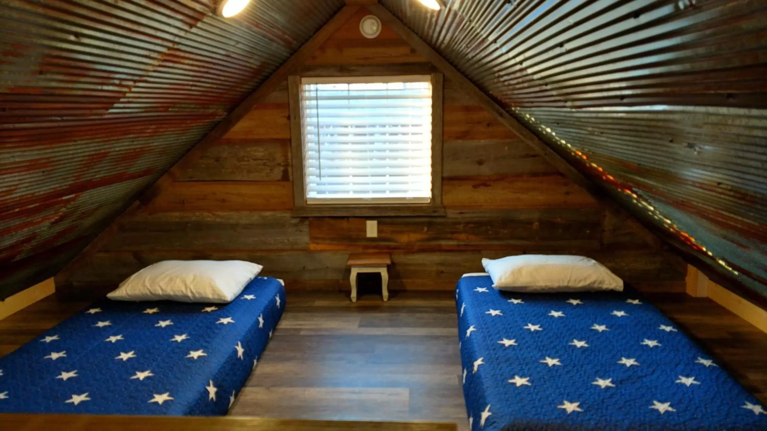 Bedroom, Bed in Knotty Squirrel Cabins
