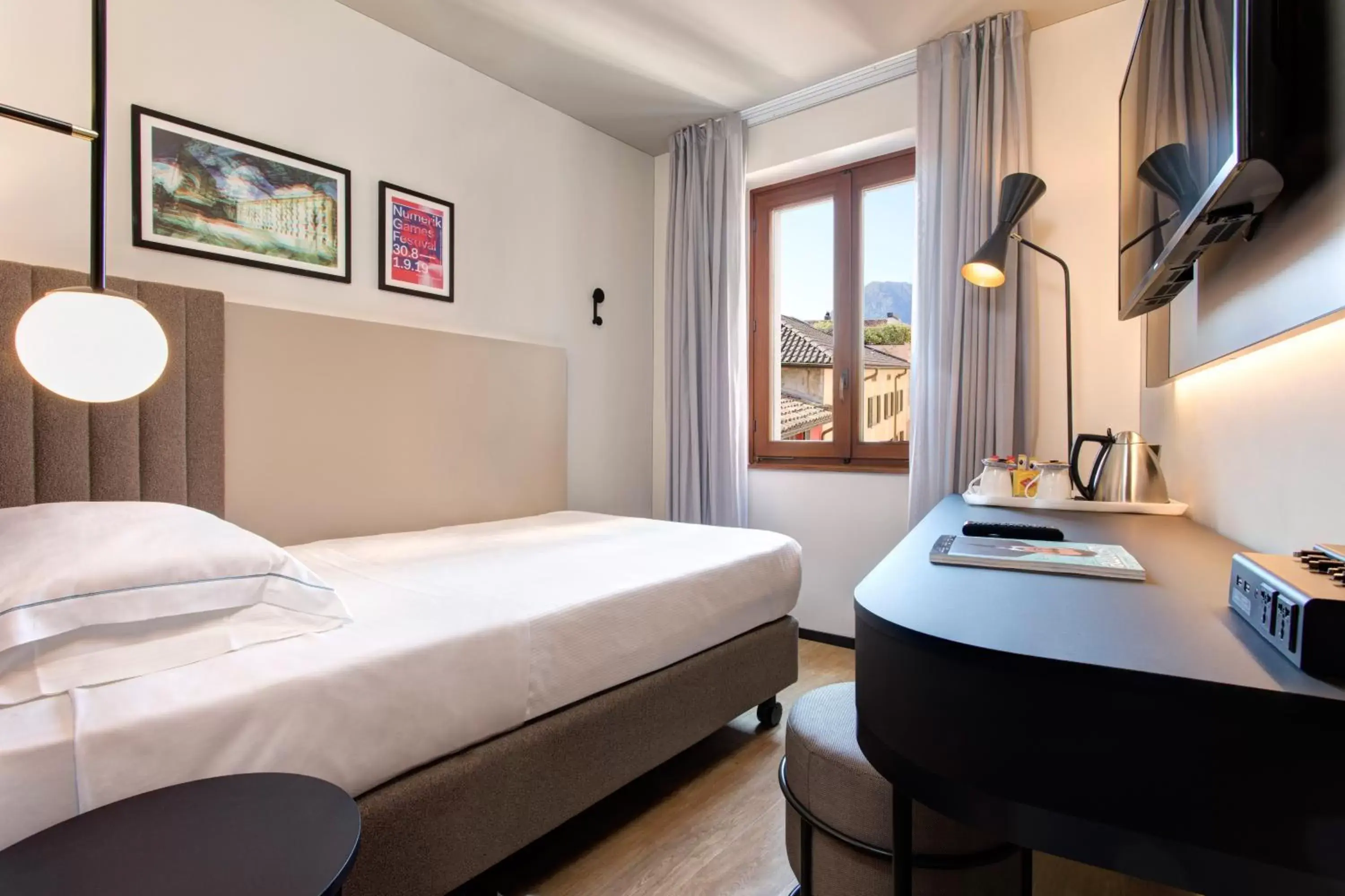 Basic room with air conditioning in LUGANODANTE - We like you